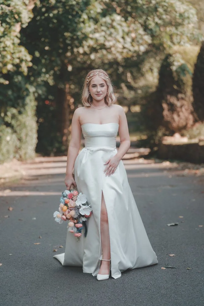 Bride photographed coming towards the camera in Darwen, UK