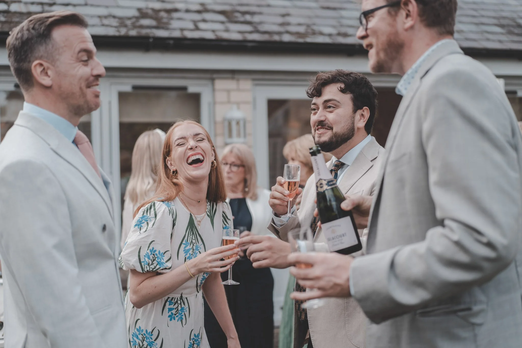 Guests having fun at Alexander and Charlotte's wedding at Friars Court, Clanfield