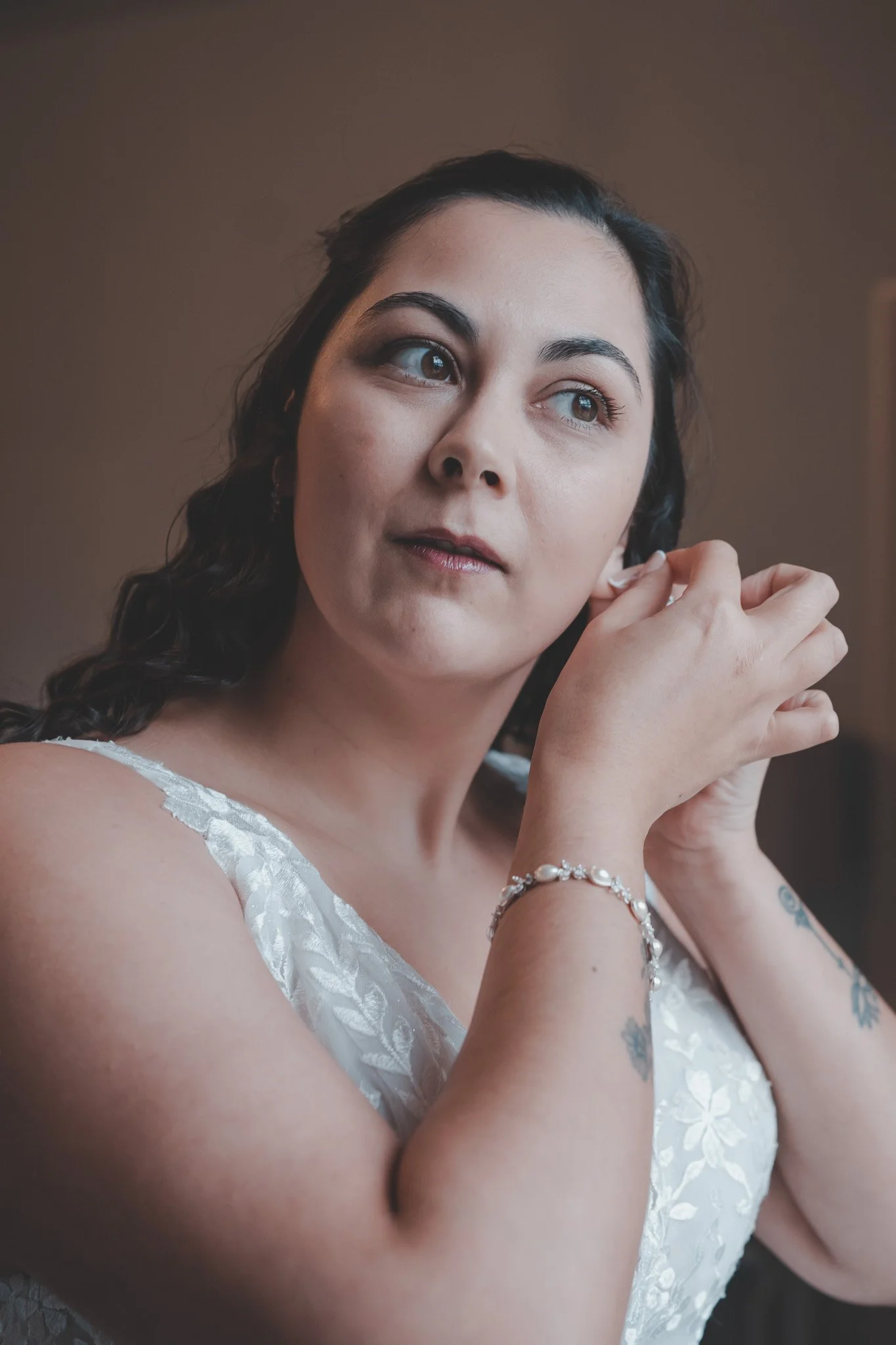 Bride getting ready during bride prep on the morning of her wedding day, at Cockliffe Country House, Arnold, Nottingham