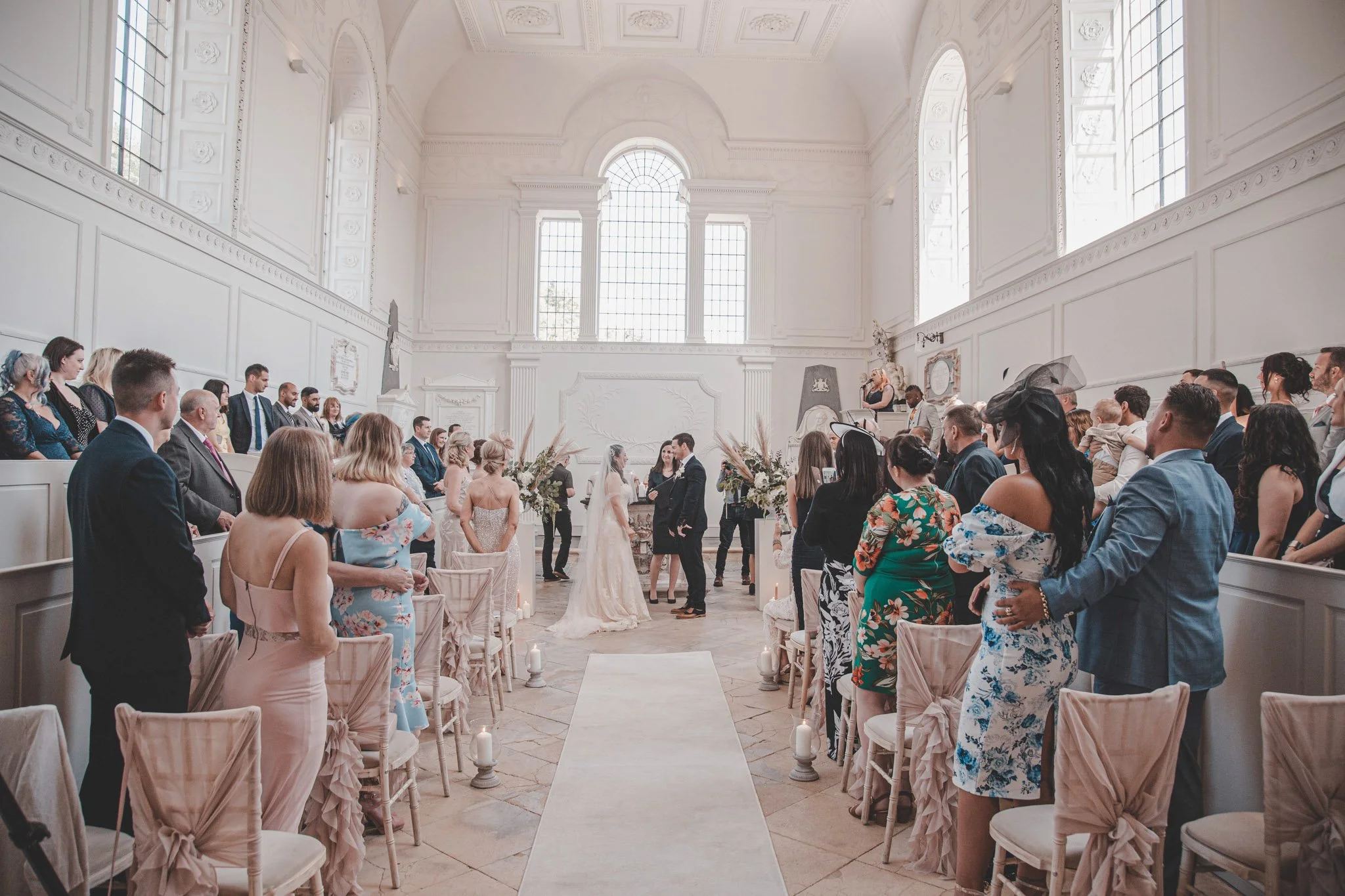 Bride and groom in front of the altar on their wedding day