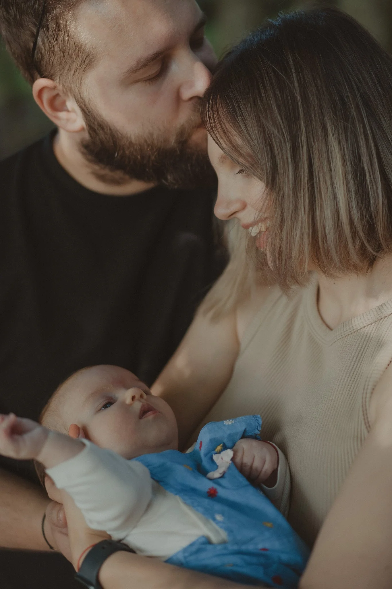 Portrait of parents and their little baby