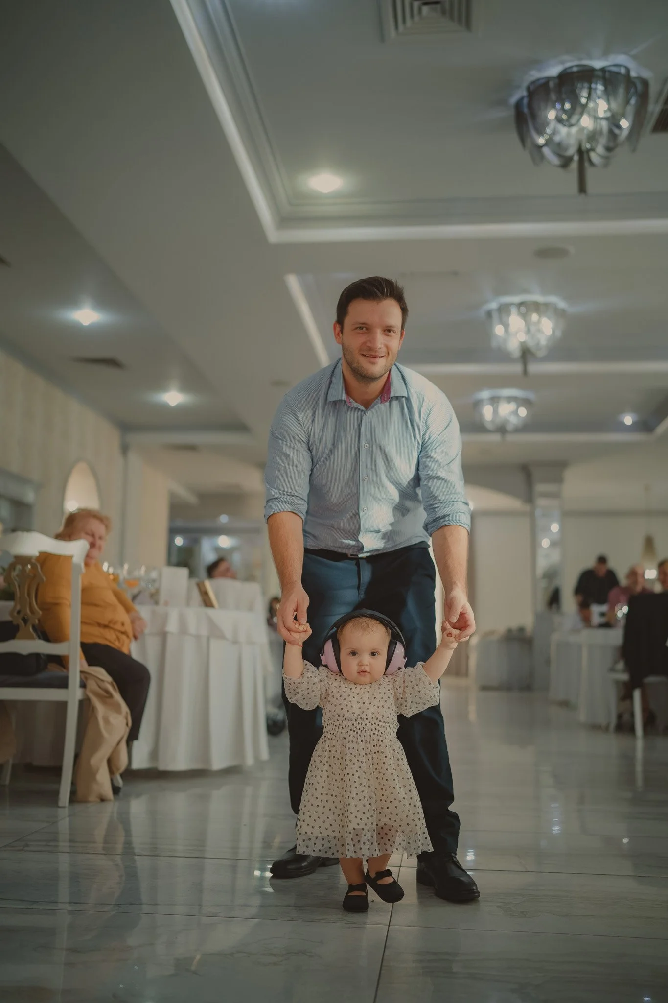 Portrait of a father and his little daughter at Hotel Royal Classic, Cluj-Napoca, Romania