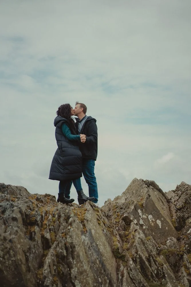 Couple kissing during a photo session at Bradgate Deer and Country Park in Leicester