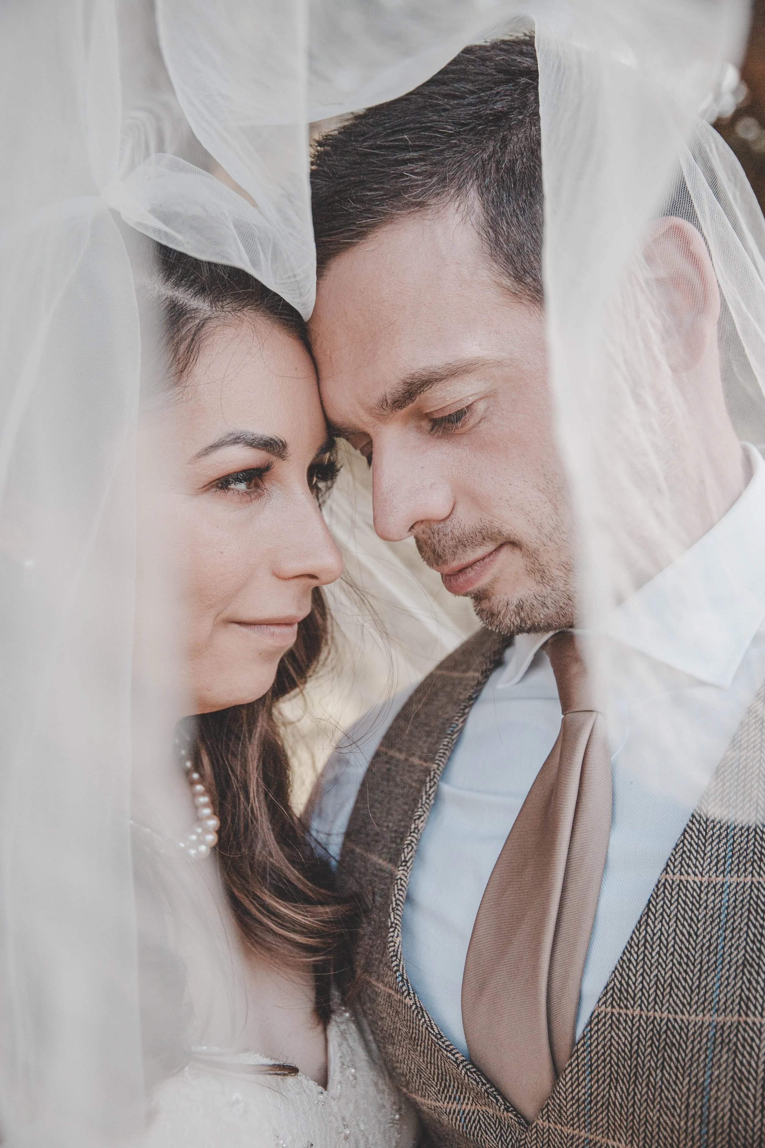 Portrait of the bride and groom on their wedding day, in West Midlands