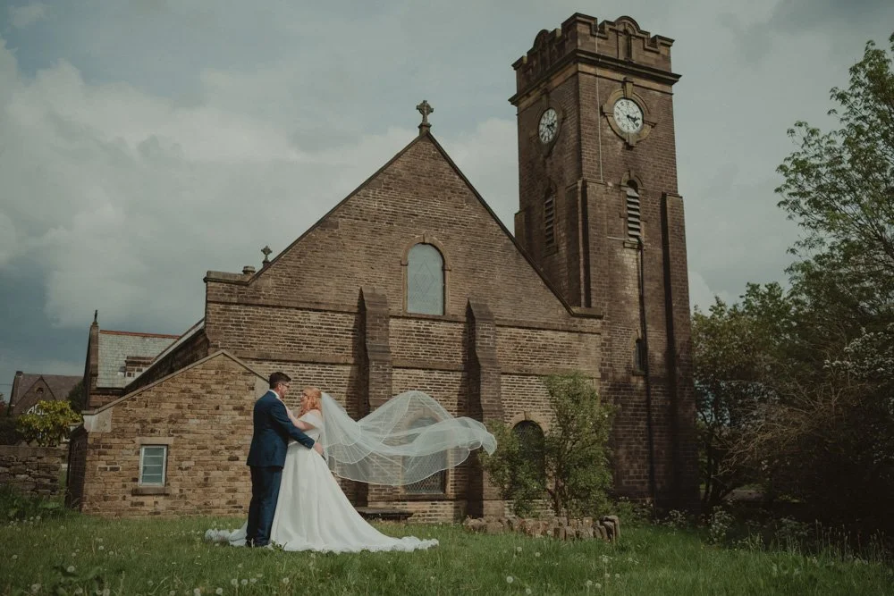 Bride and groom during the couple photoshoot on their wedding day, at The White Hart Inn at Lydgate