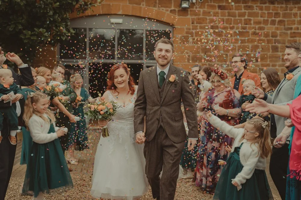 Confetti exit after a wedding at The Barns at Hunsbury Hill
