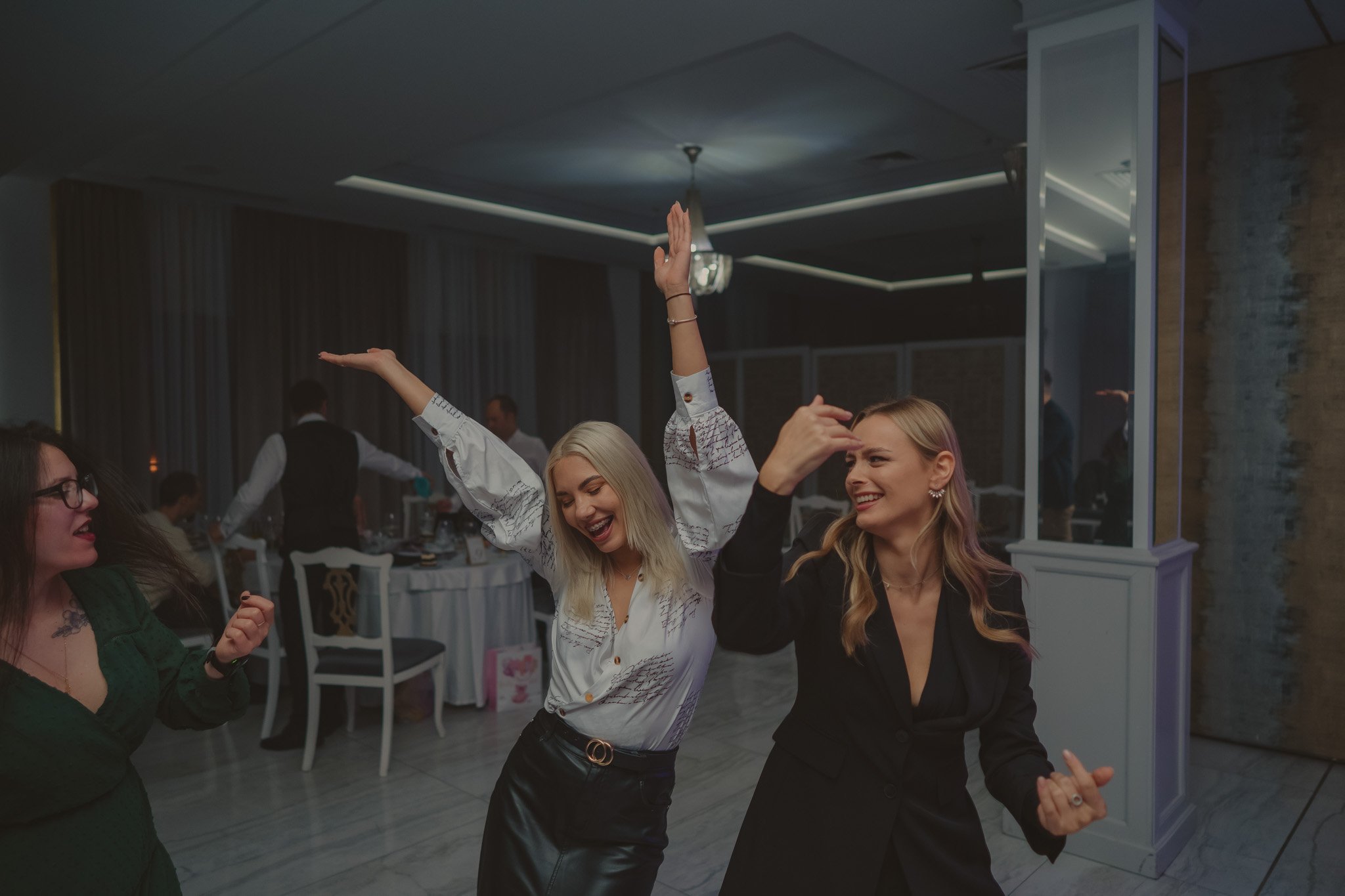 Guests photographed on the dance floor during a Christening party at Hotel Royal Classic, Cluj-Napoca, Romania