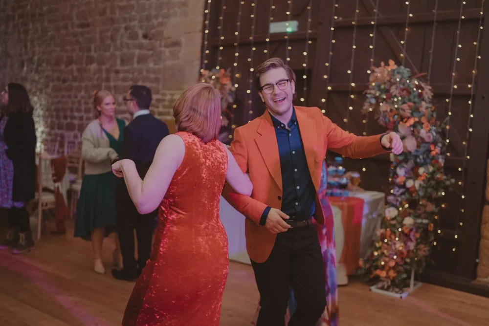 Guests having fun on the dance floor at a wedding in the Midlands, UK