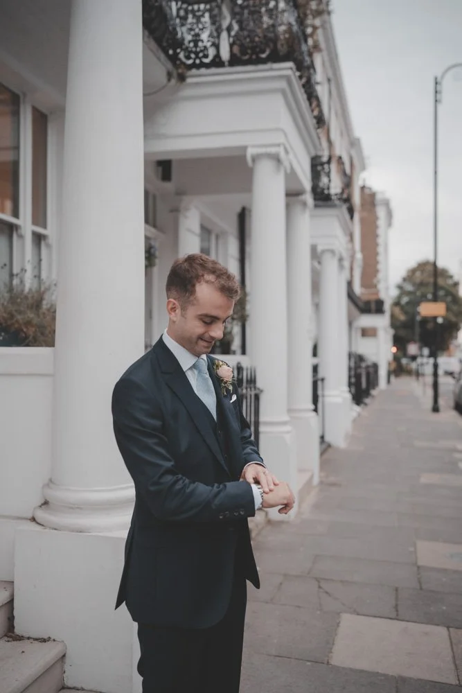 Groom photographed on the streets of London