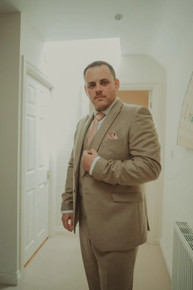 Portrait of groom, on the wedding morning in Wiltshire