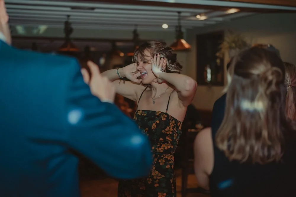Girl photographed dancing and singing on the dance floor at The Chester Fields Country Pub, Restaurant & Wedding Venue, UK