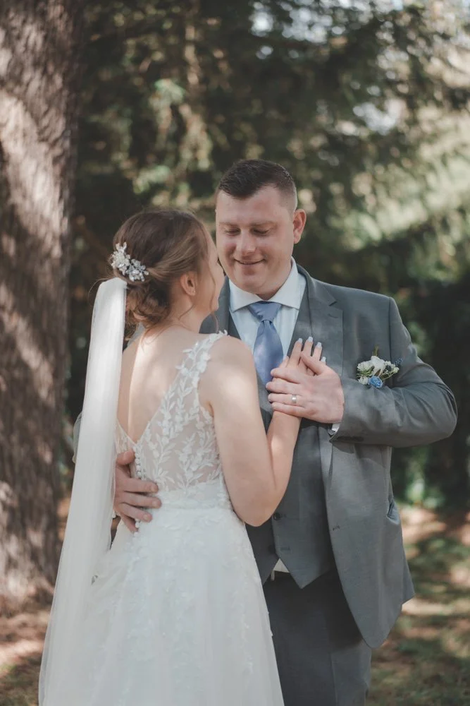 Bride and groom during the couple photoshoot on their wedding day at Monks Barn, Hurley, UK
