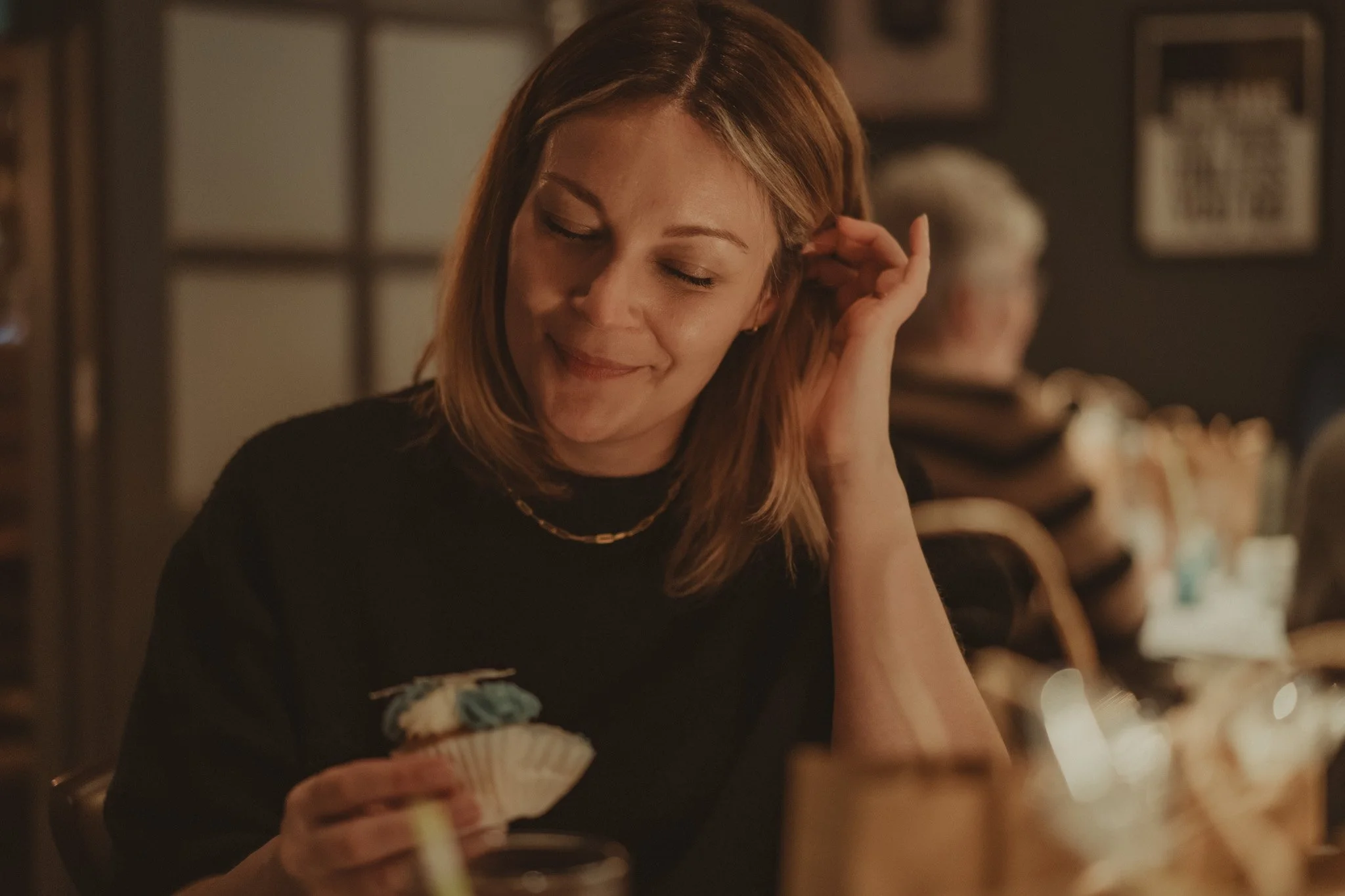 Woman having a good time at a baby shower at The Millpool in Coventry