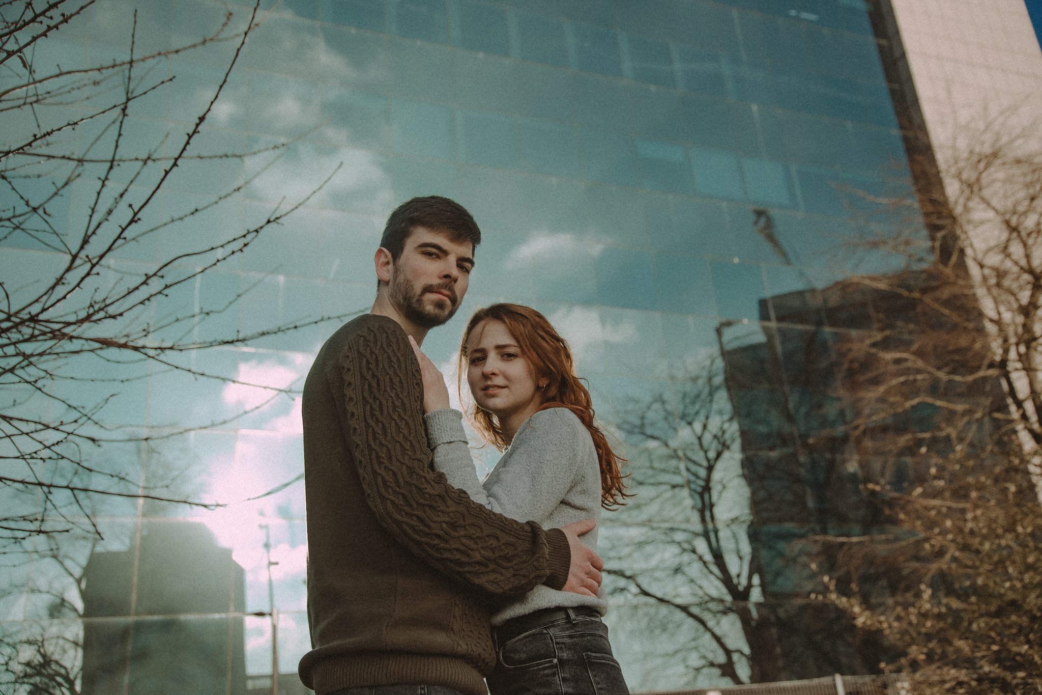 Embraced couple looking at the camera in Coventry