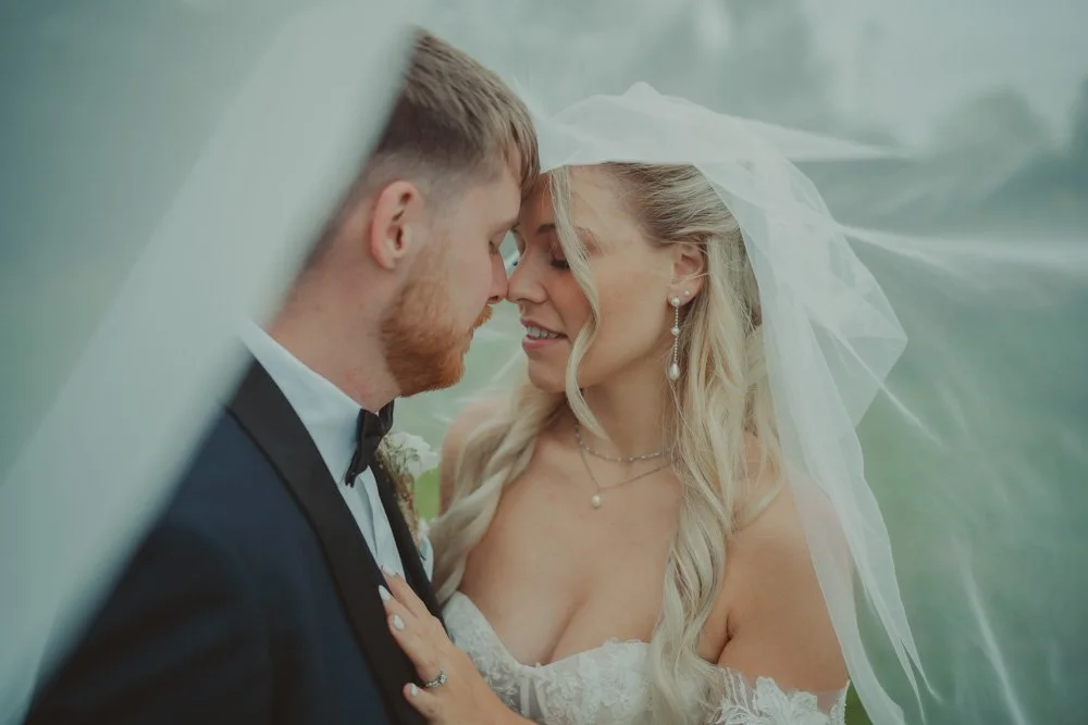 Close-up and intimate portrait of bride and groom, on their wedding day at Gwesty'r Emlyn Hotel in Newcastle, Wales