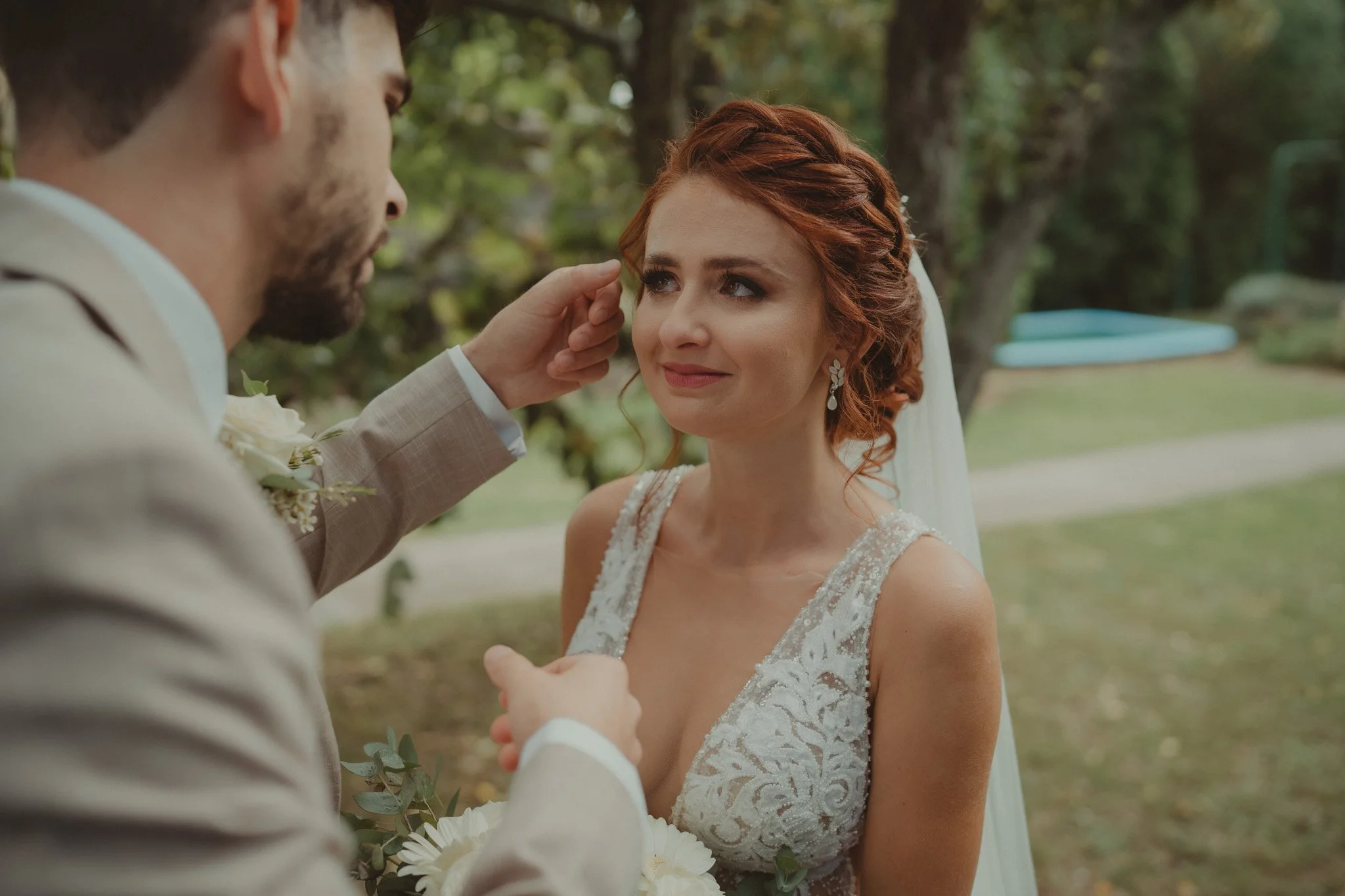 Bride in tears during the first look in the morning of her wedding day