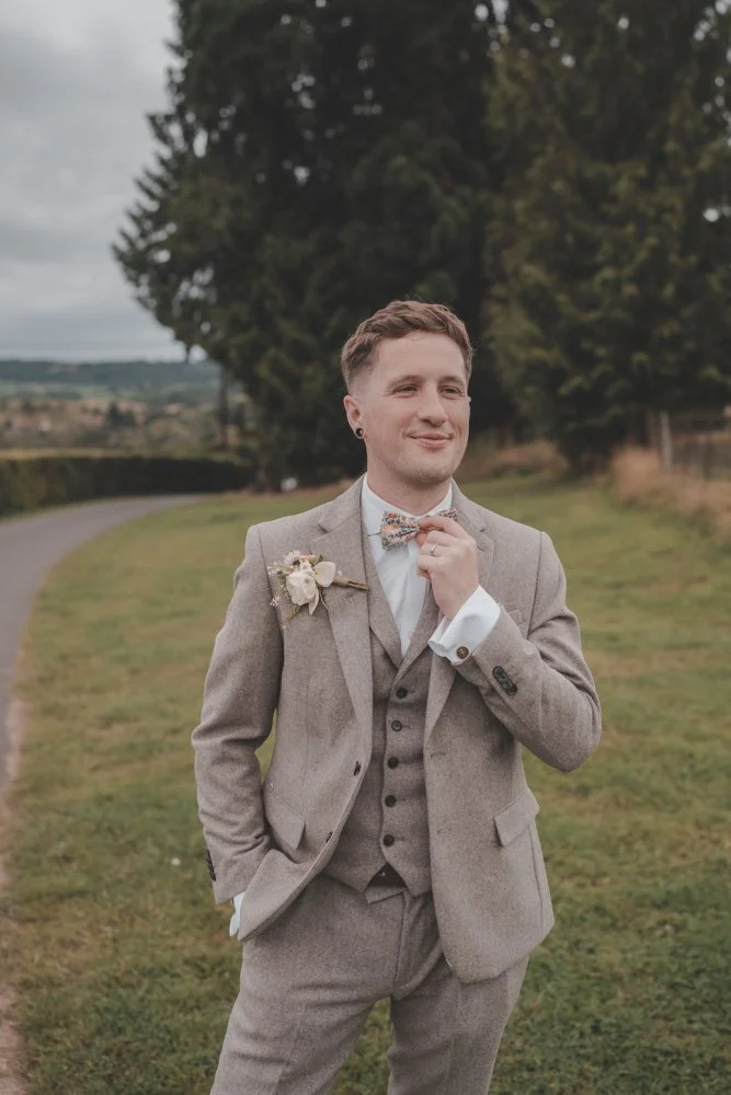 Half body portrait of a groom, at The Courtyard at Shelsley Walsh