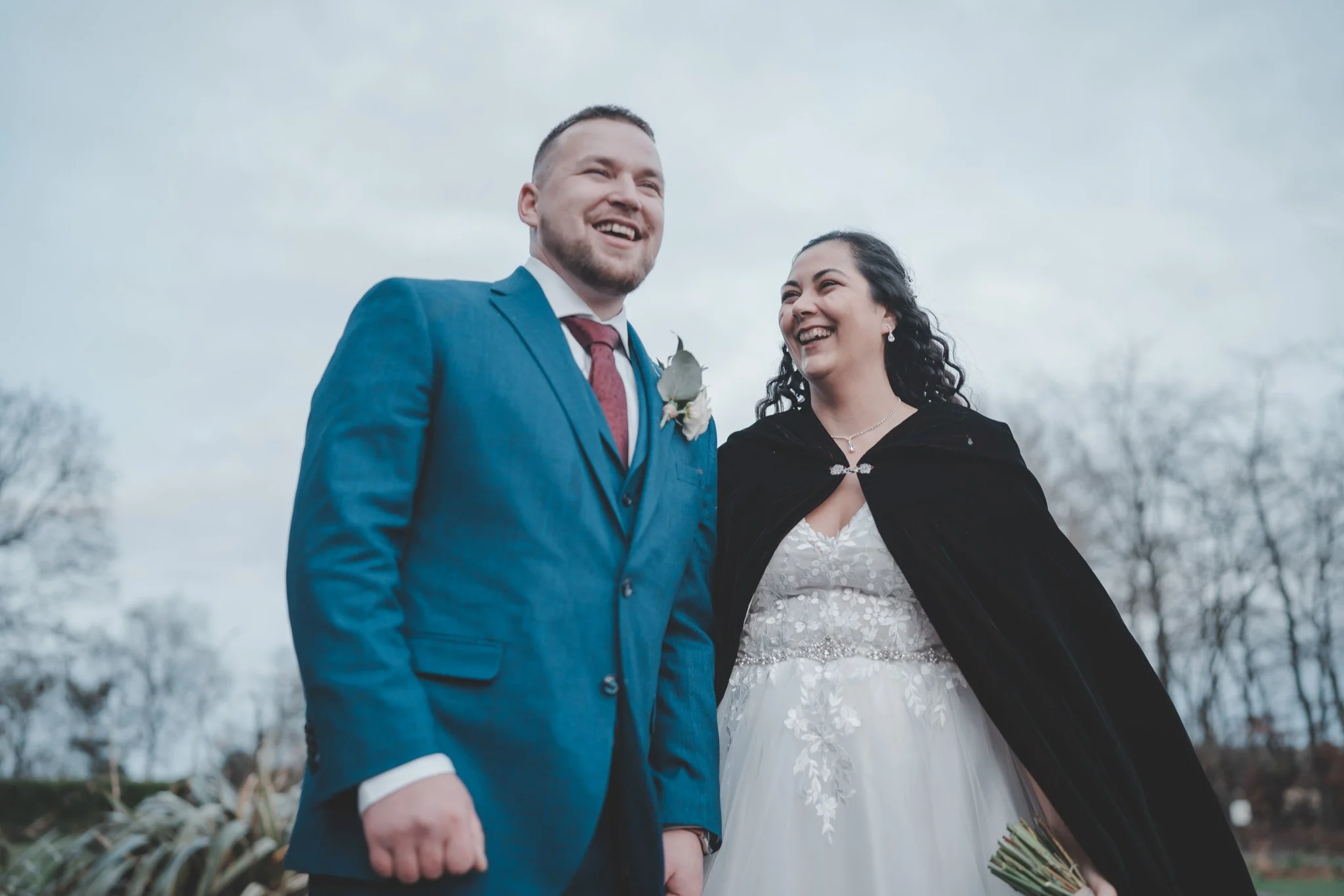 Candid portrait of bride and groom during their couple photoshoot on their wedding day at Cockliffe Country House, Nottingham