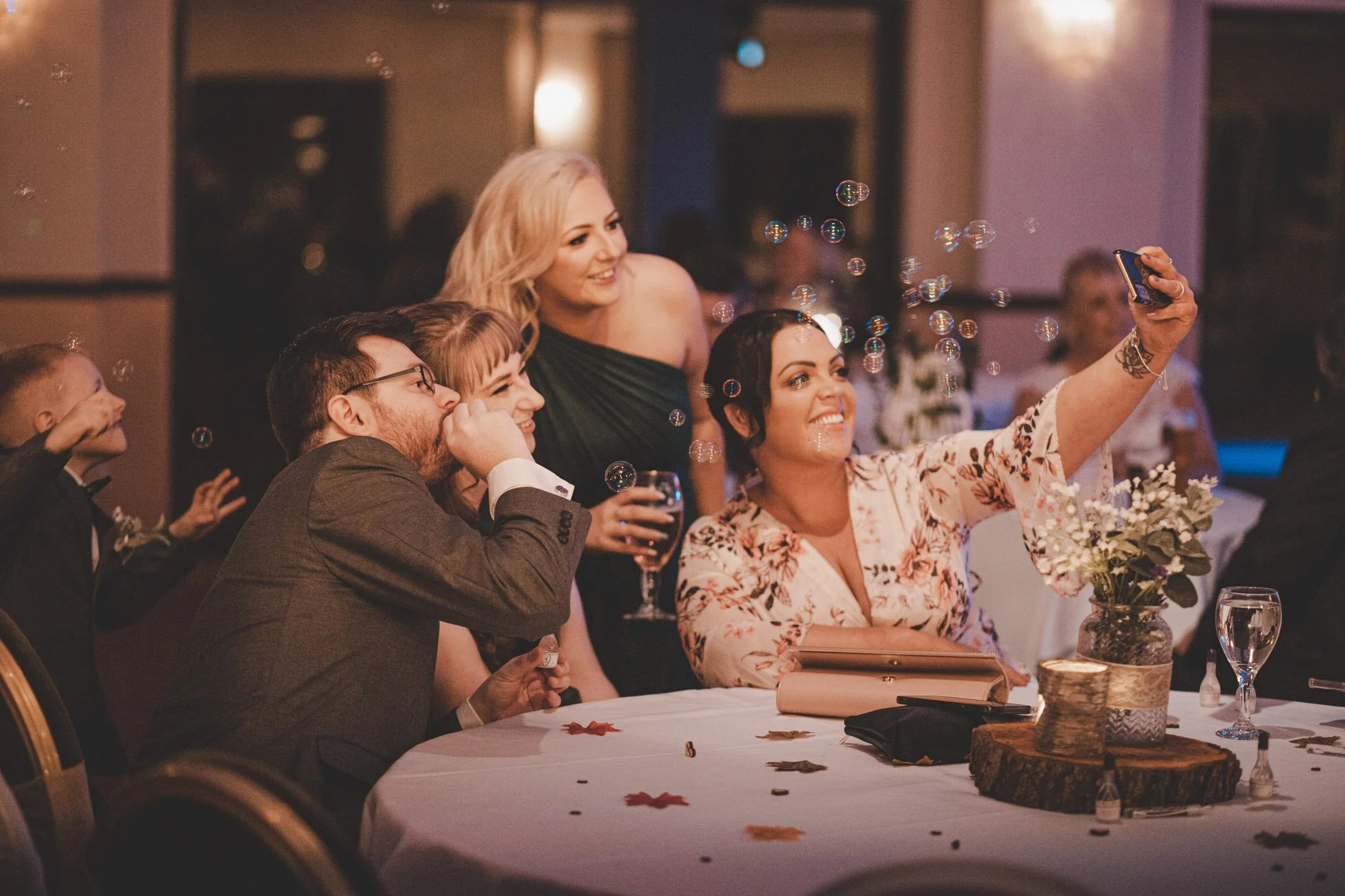 Guests taking a selfie during wedding party at Arden Hotel in Coventry