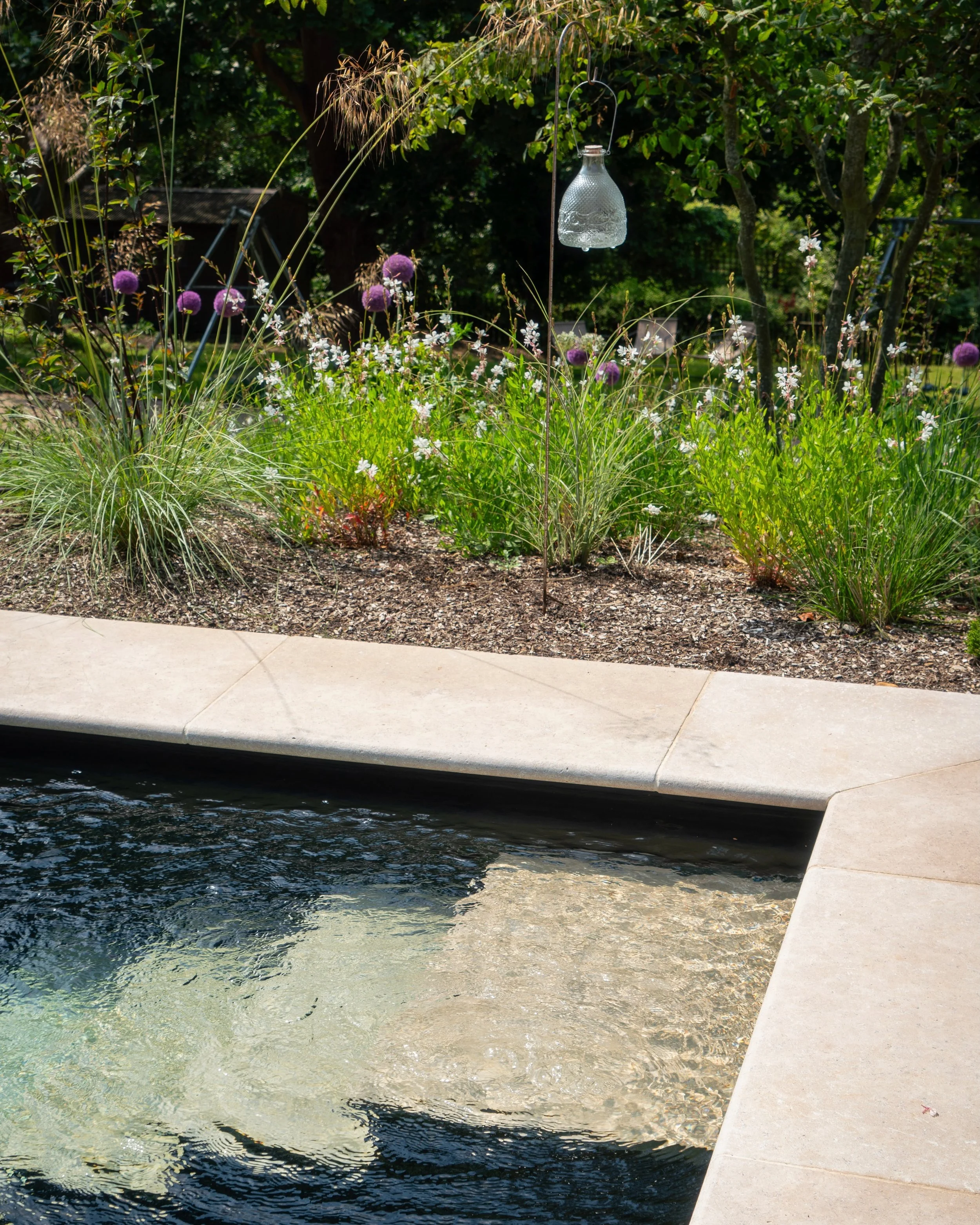 Warm weather calls for a garden like this. 

A space designed for relaxing, entertaining, and making the most of every sunny day. From the paving and planting to the finishing touches, every detail has been carefully crafted to create a garden that&r