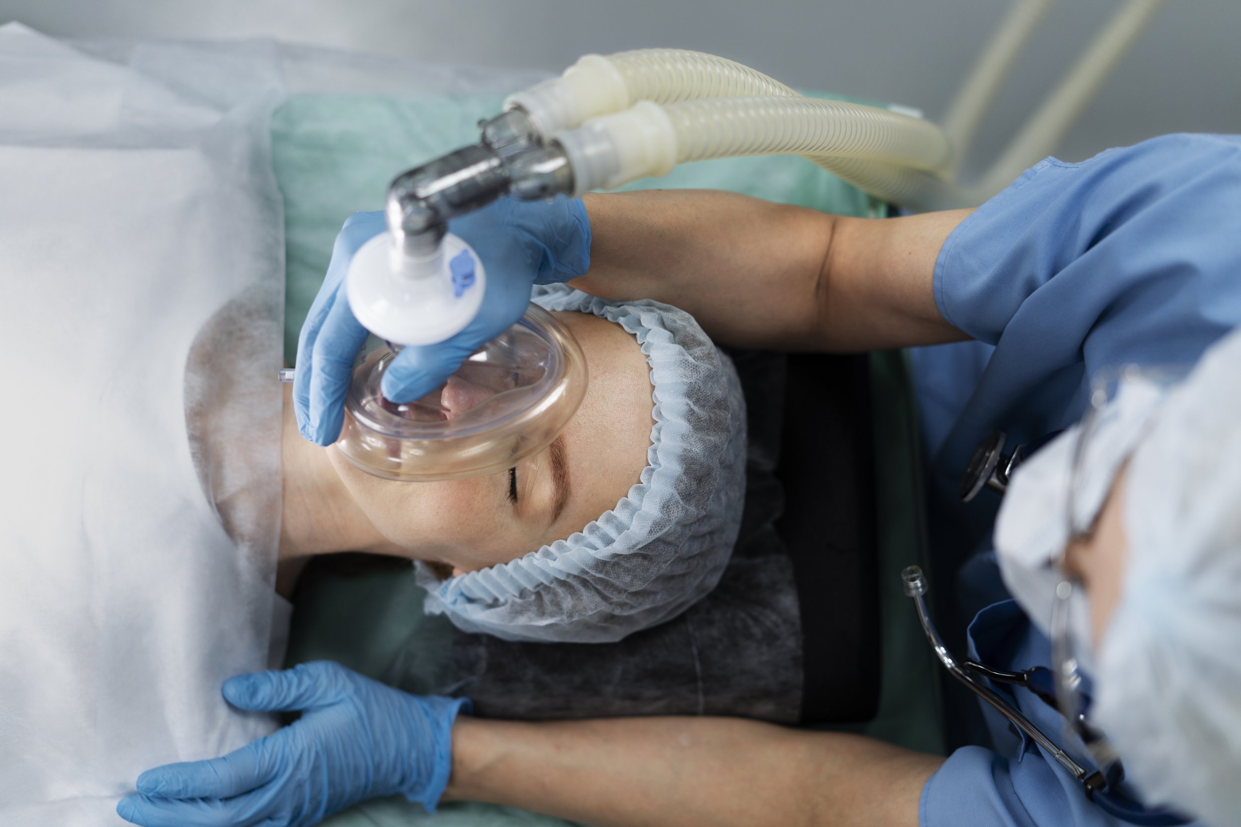 nurse-putting-oxygen-mask-patient.jpeg