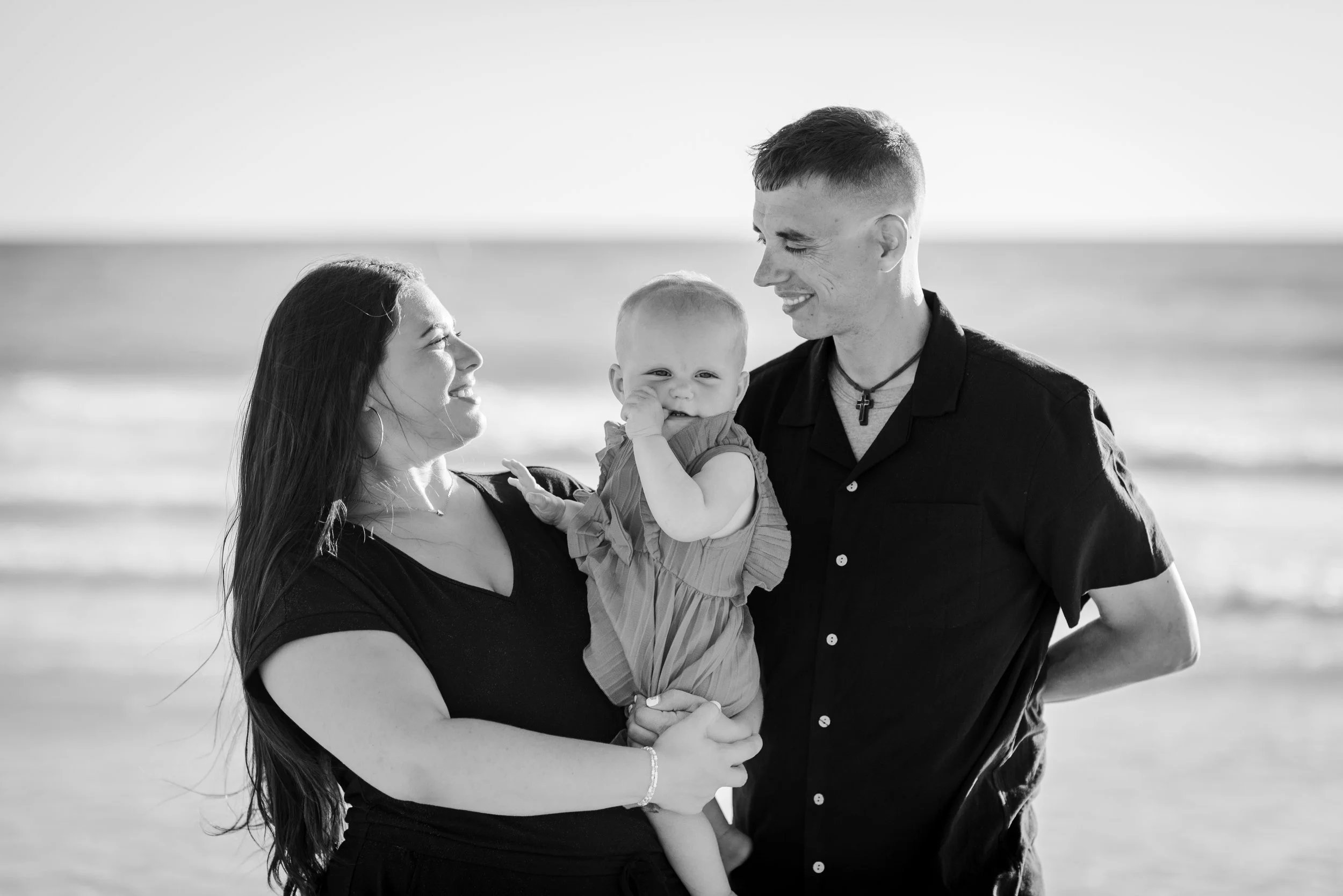 Black and white family portrait with baby on the beach, Anna Maria Island
