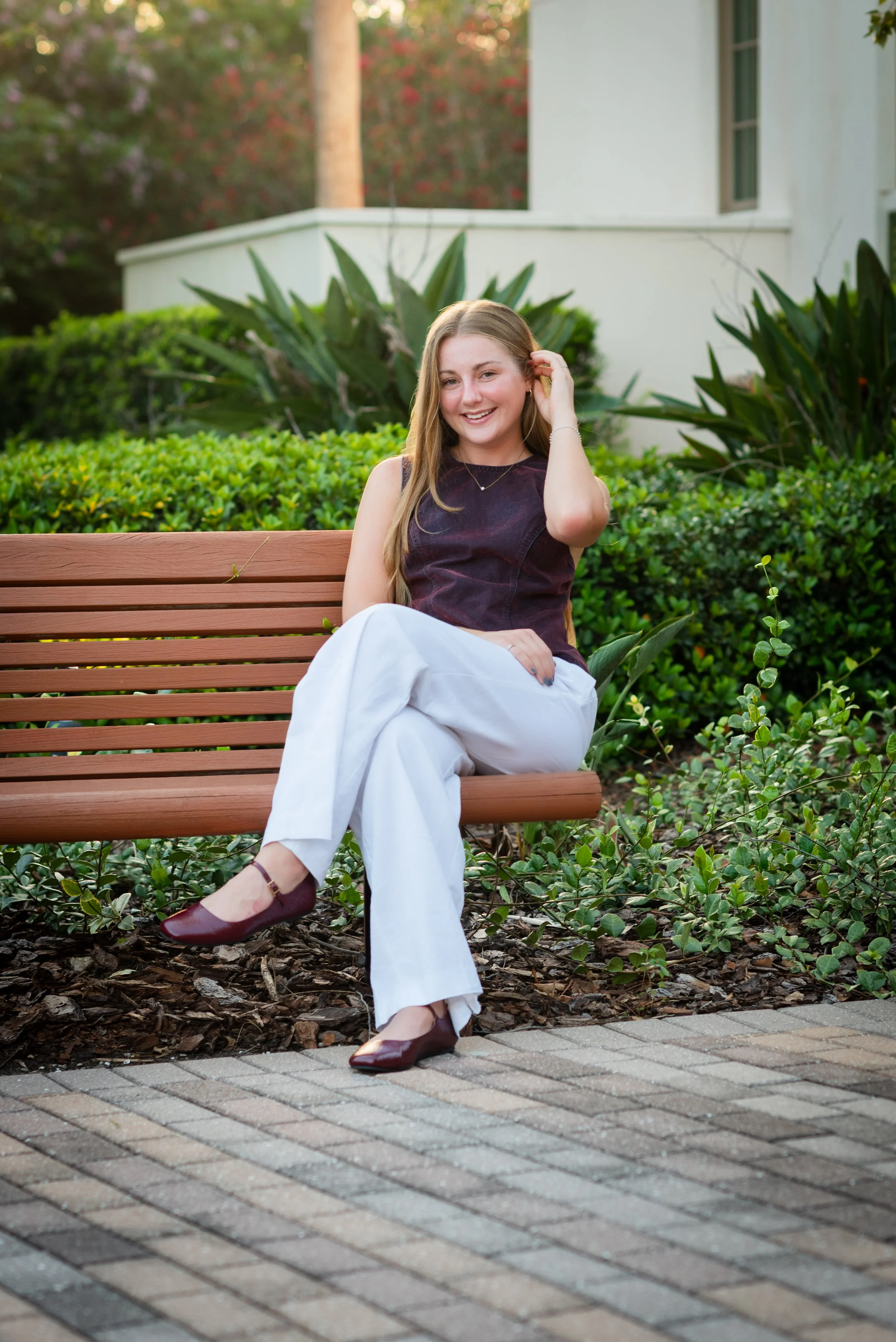 Teen girl sitting on bench at Starling Clubhouse, FishHawk FL