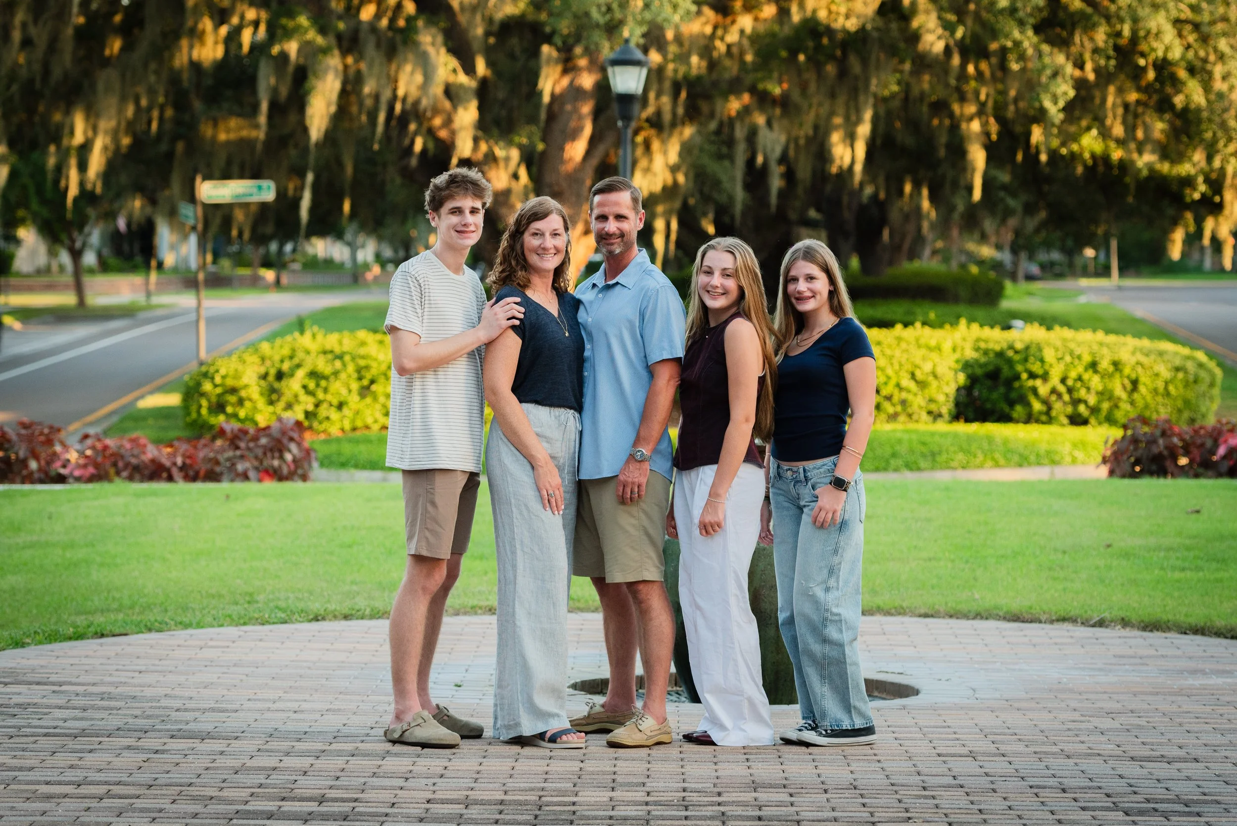 Family portrait on brick pathway at Starling Clubhouse, FishHawk