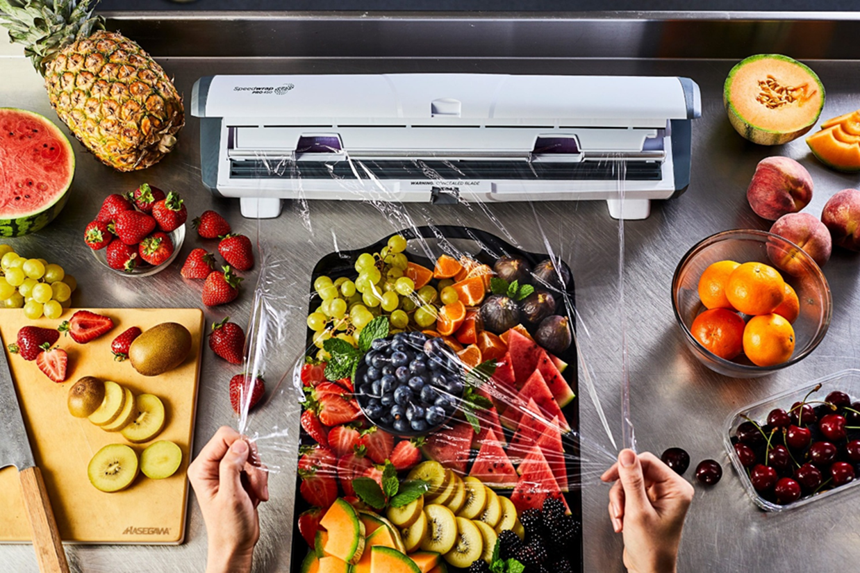 food being covered in plastic cling-film