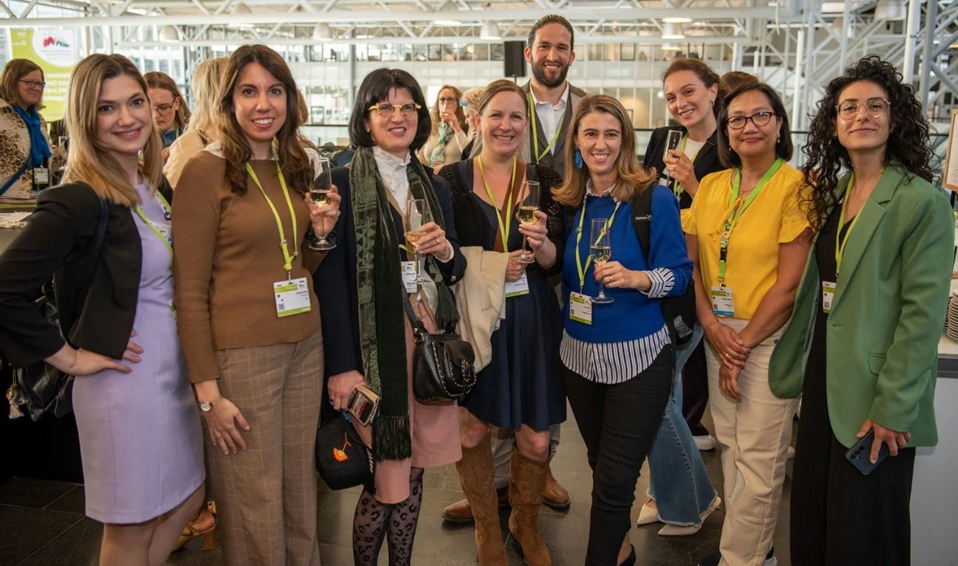 group photo of team members at exhibition event