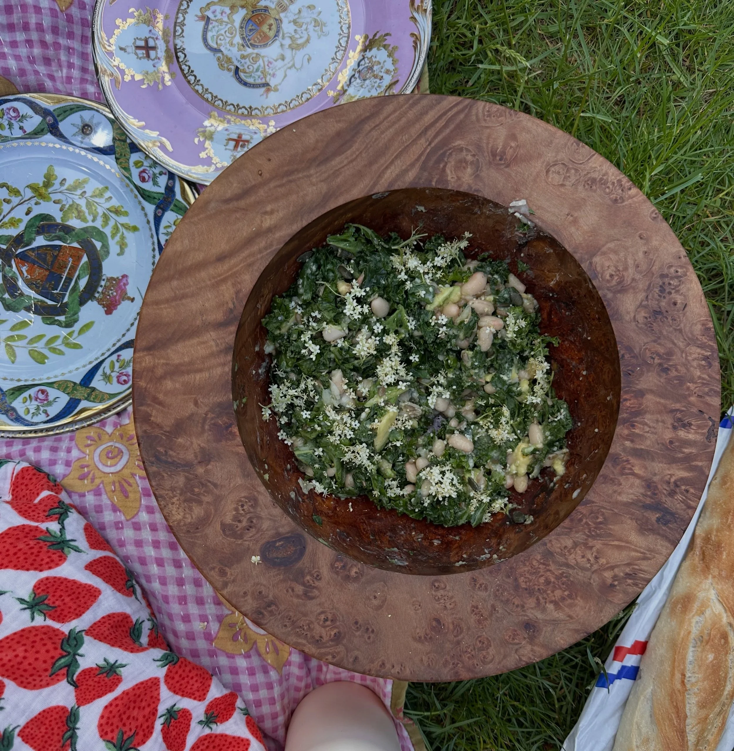 Don't save elderflowers for sweet for they make a delightful addition to salads too. Here is a picnic salad (greens, white beans, avocado, seeds, zingy dressing) with a head of elderflower plucked as we laid down the rug.  Roast chicken. Baguette. Pe