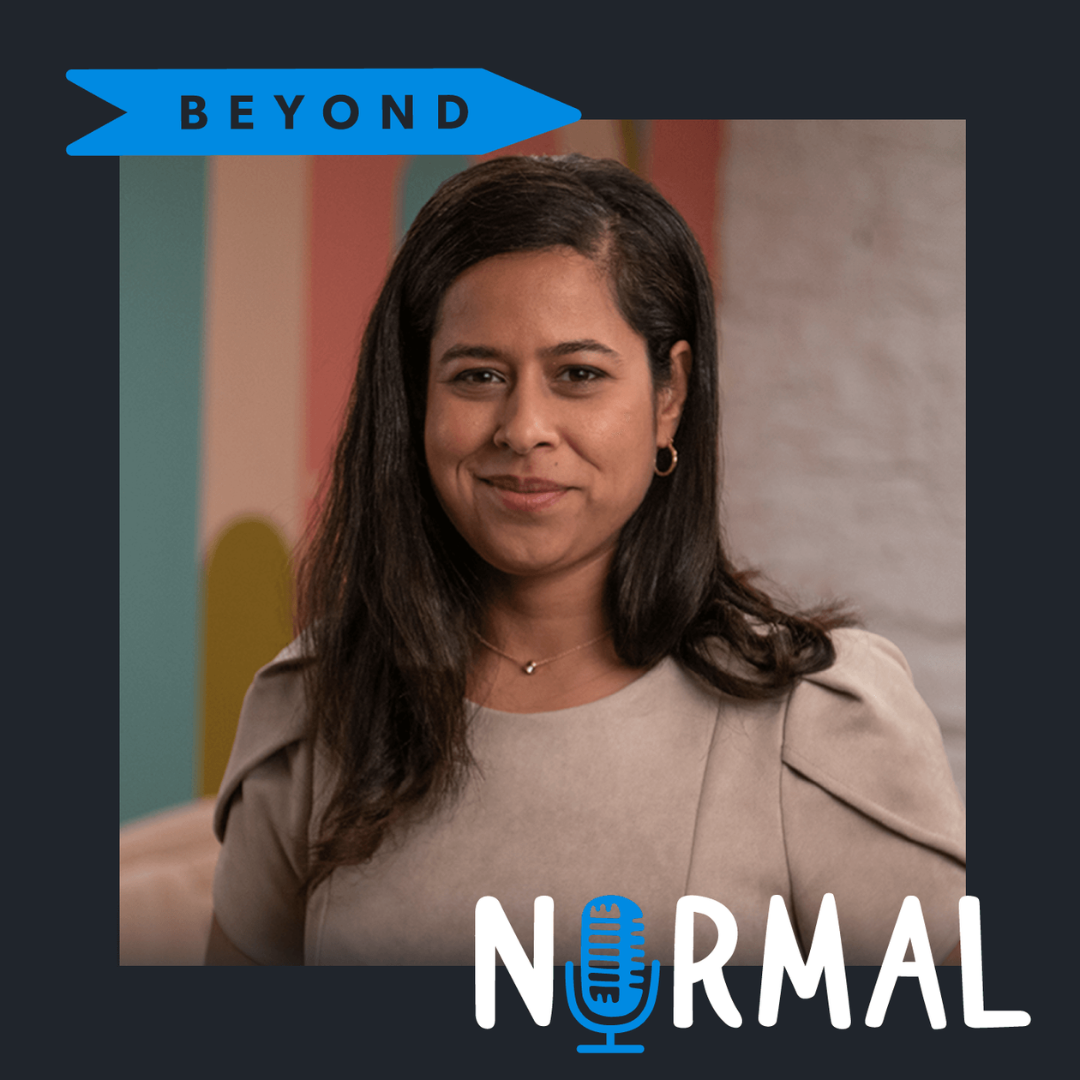 Aparna Rae, a woman with dark hair and earrings smiling in front of a colorful background, with a blue banner at the top that says 'BEYOND' and the word 'NORMAL' with a microphone icon at the bottom.