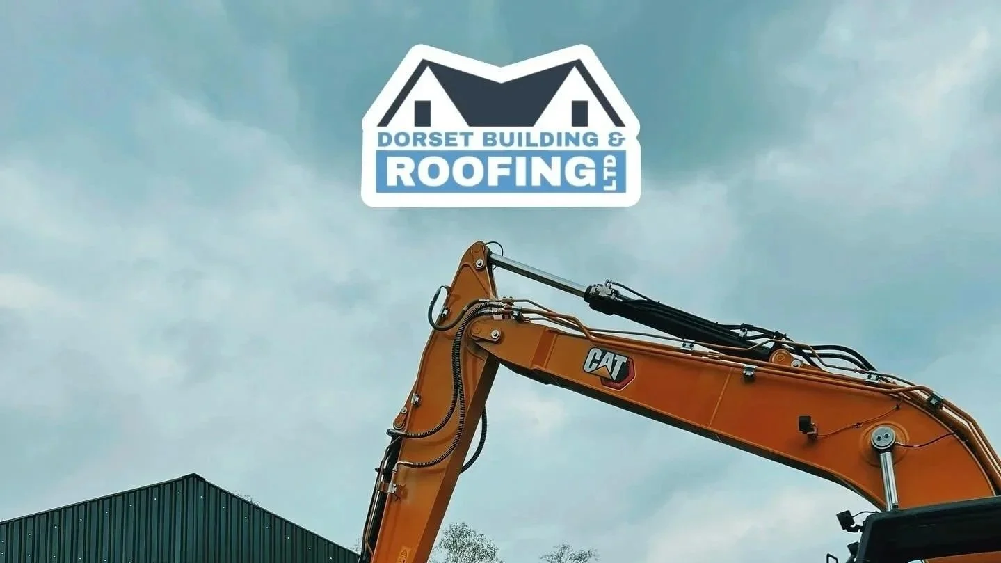 Construction excavator arm with a logo of Dorset Building & Roofing Ltd above a cloudy sky.