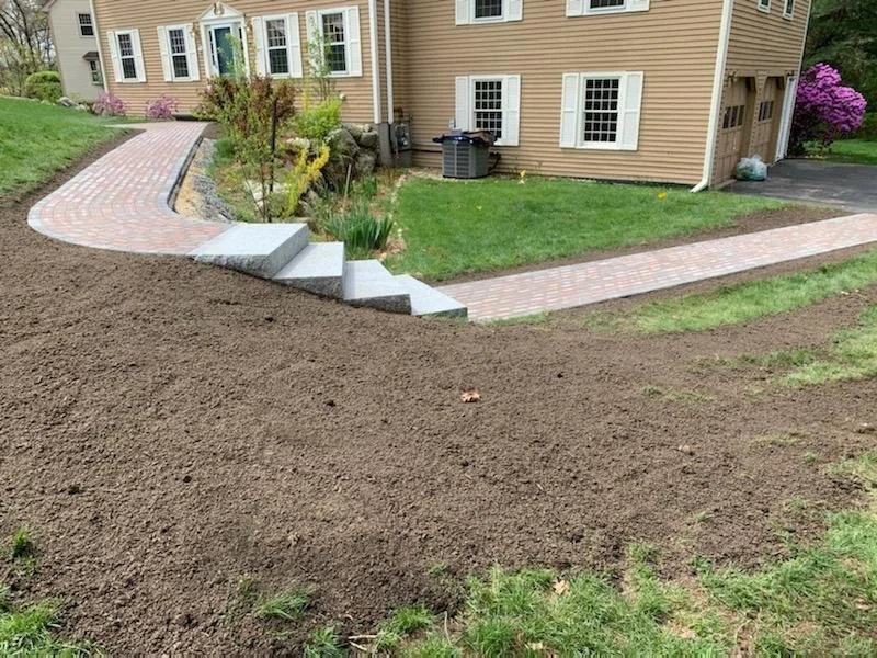 Brick walkway with granite steps.