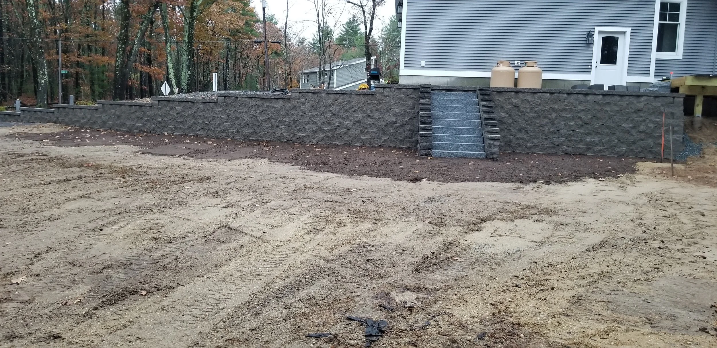 Large retaining wall with steps.