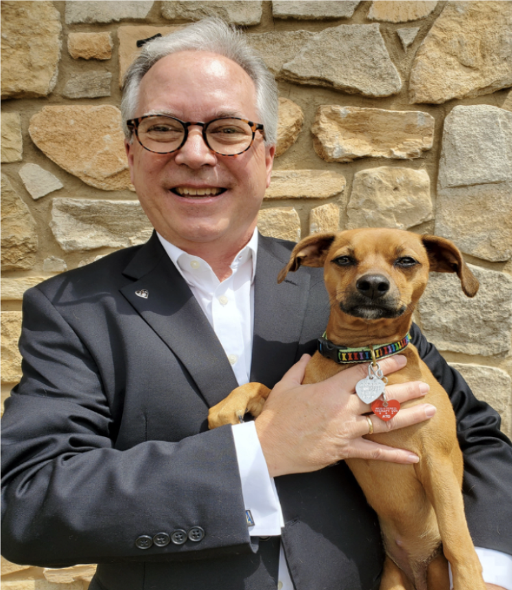 Larry with therapy dog Angel