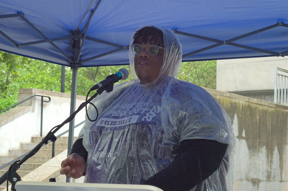   Timotheus "T.J." Gordon, Jr. speaks onstage. 