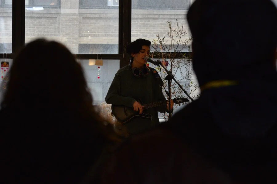  Photo of musician from audience angle. Photo credit JP Gomez. 