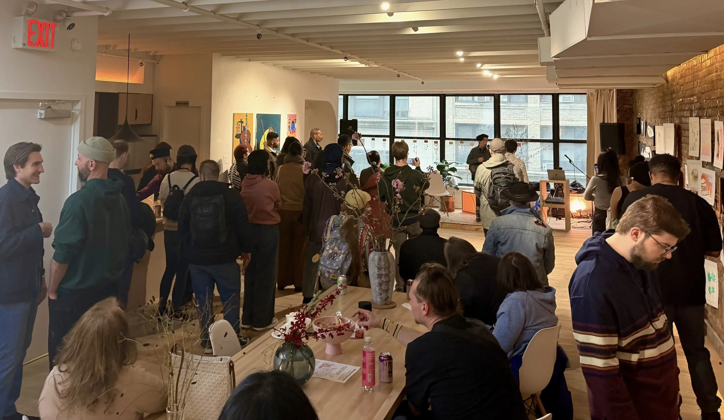  Image of attendees at art exhibition. 