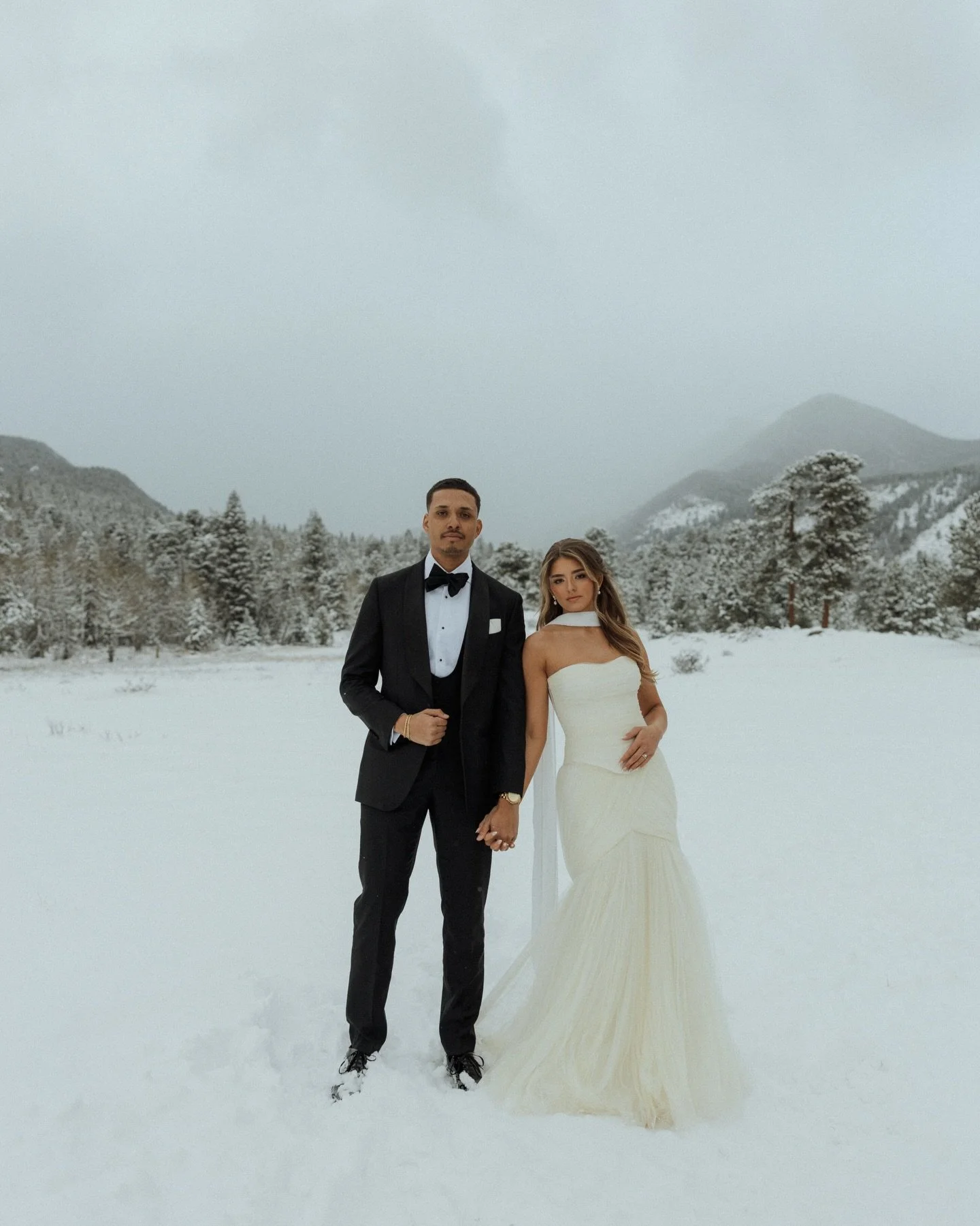 chelsey &amp; noah in the rockies 🤎
&bull;
&bull;
&bull;
#coloradophotographer #minnesotaphotographer #rockymtnbride #colorado #weddingphotographer colorado wedding, minnesota wedding, photographer, winter wedding