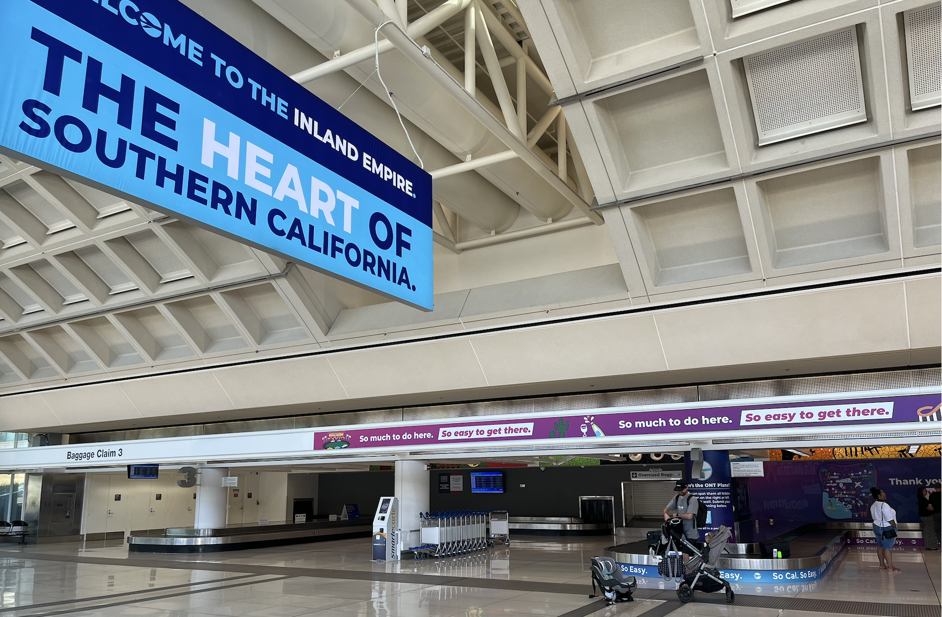 Baggage Claim Carousel and Overhead Welcome Signage
