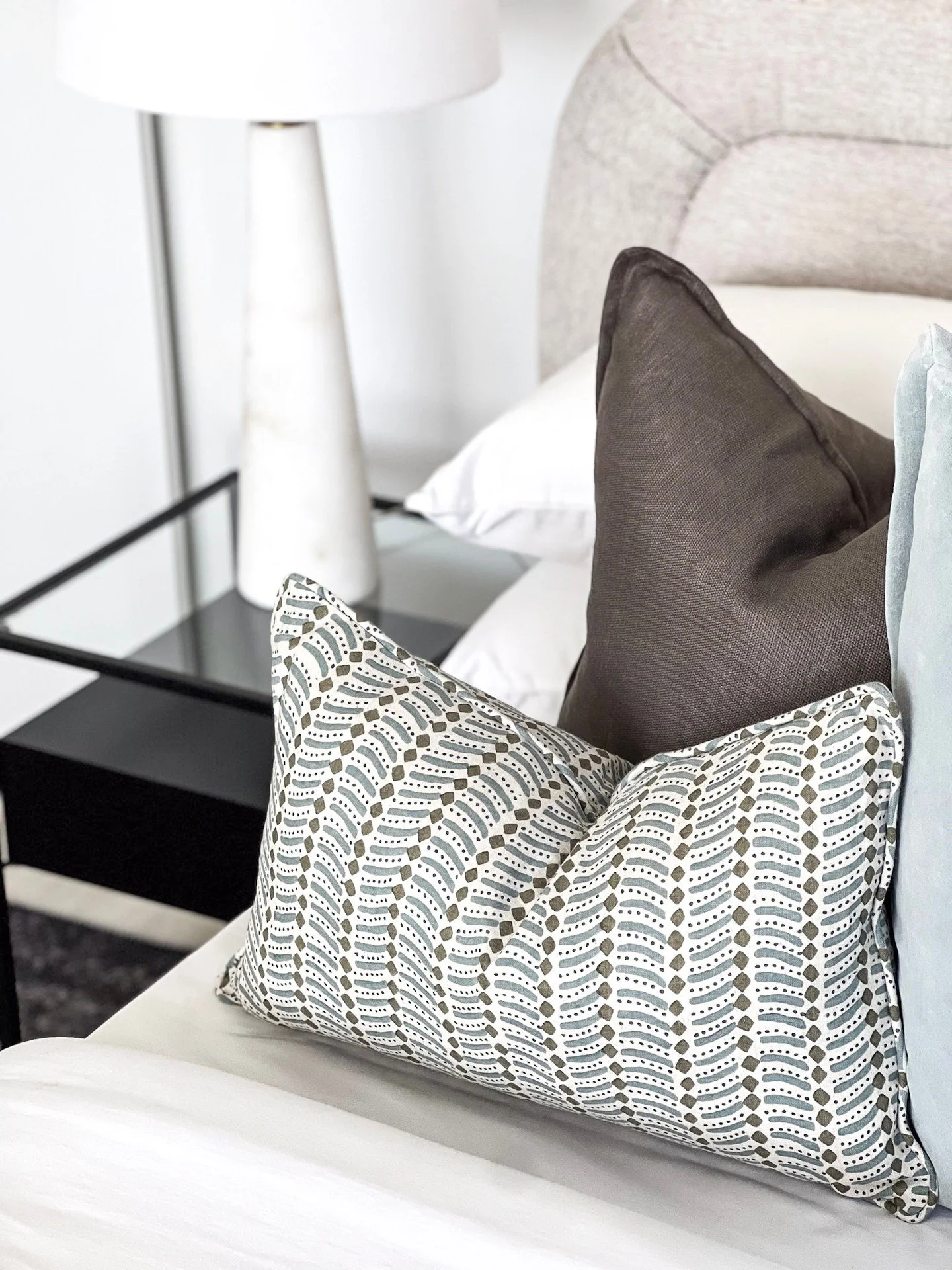 Texture on texture
A well-dressed bed speaks to warmth, comfort, and care, all of which tell buyers, this home is loved.

And when a home feels loved? It sells faster.