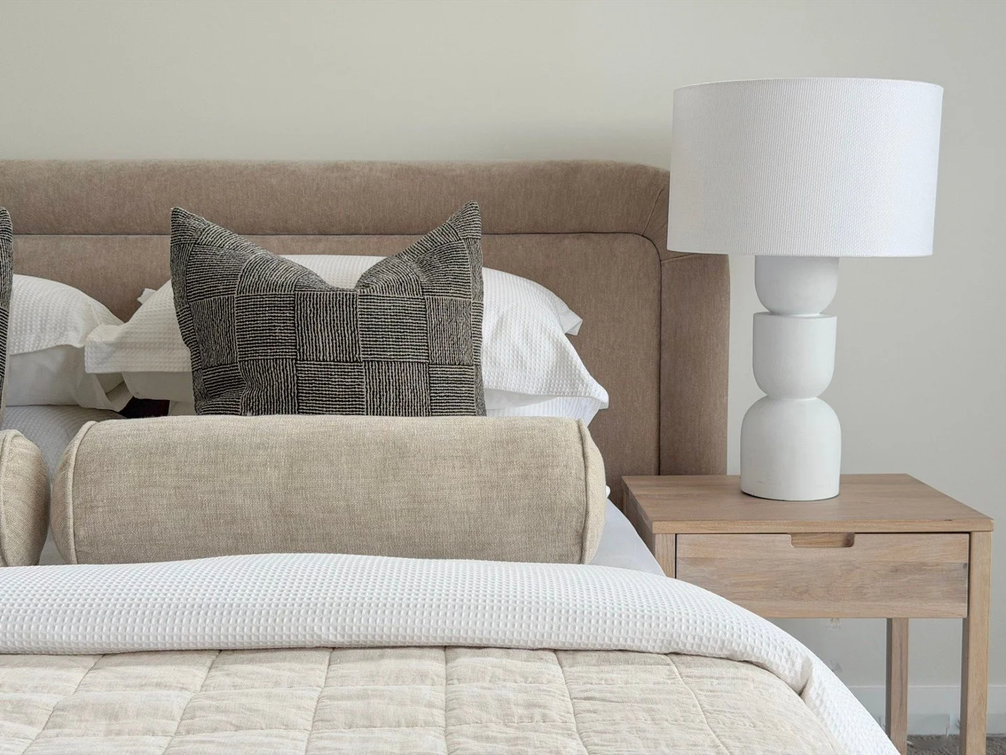 This is where a room starts to feel inviting.

Texture softens spaces visually and emotionally, especially in homes with neutral palettes. It adds depth without clutter and helps rooms feel comfortable rather than staged.