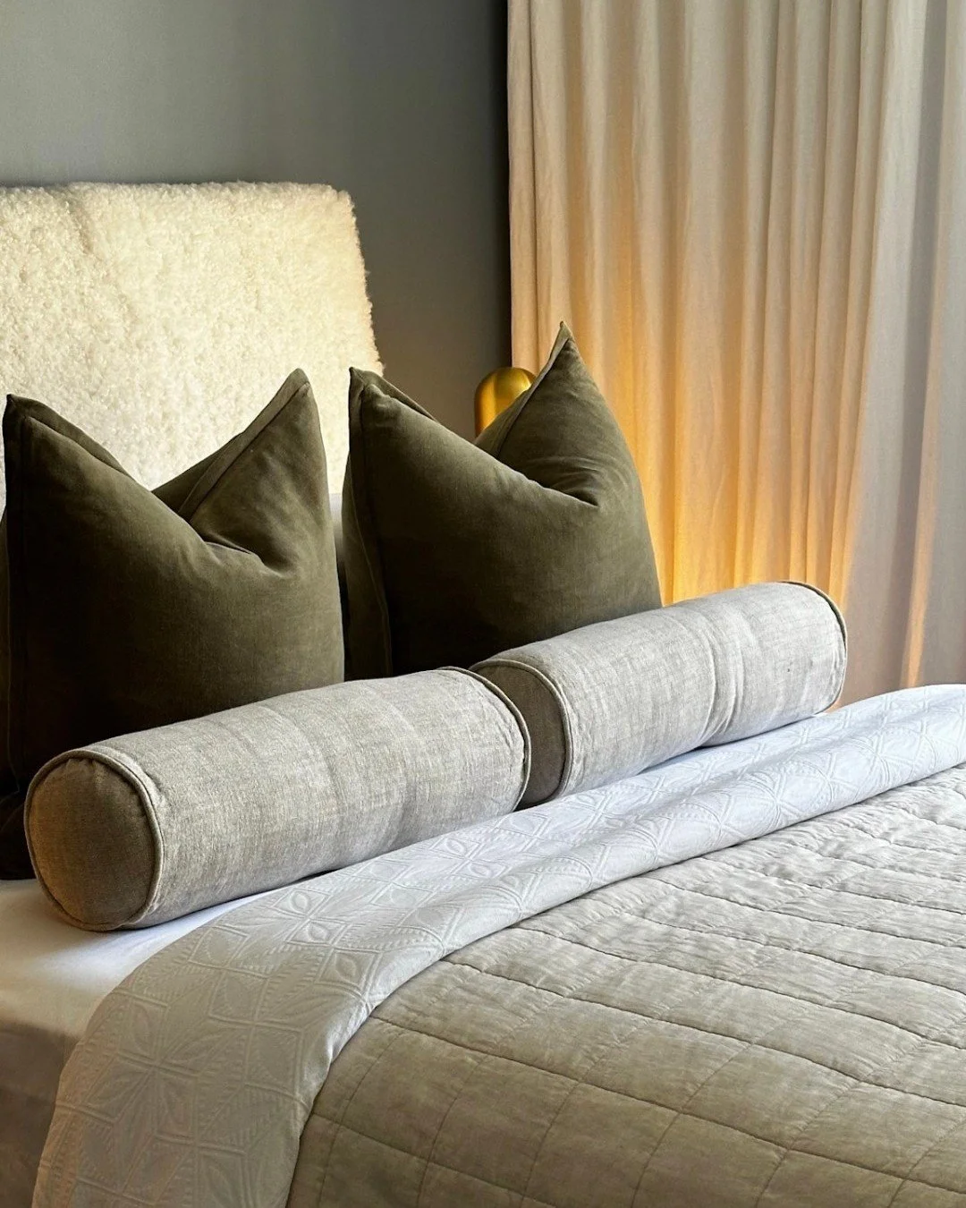 A bedroom should feel like retreat.

Soft textures and warm light create a space that feels easy to settle into.