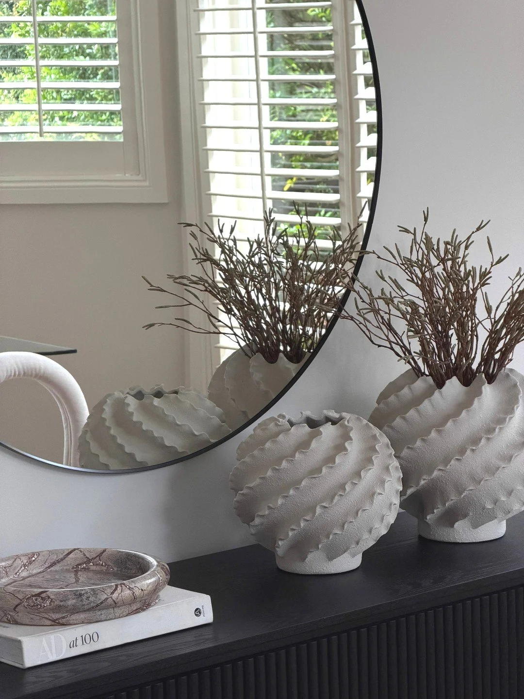 It&rsquo;s often the smaller moments that bring a space together.

Texture, reflection, and placement working quietly in balance.