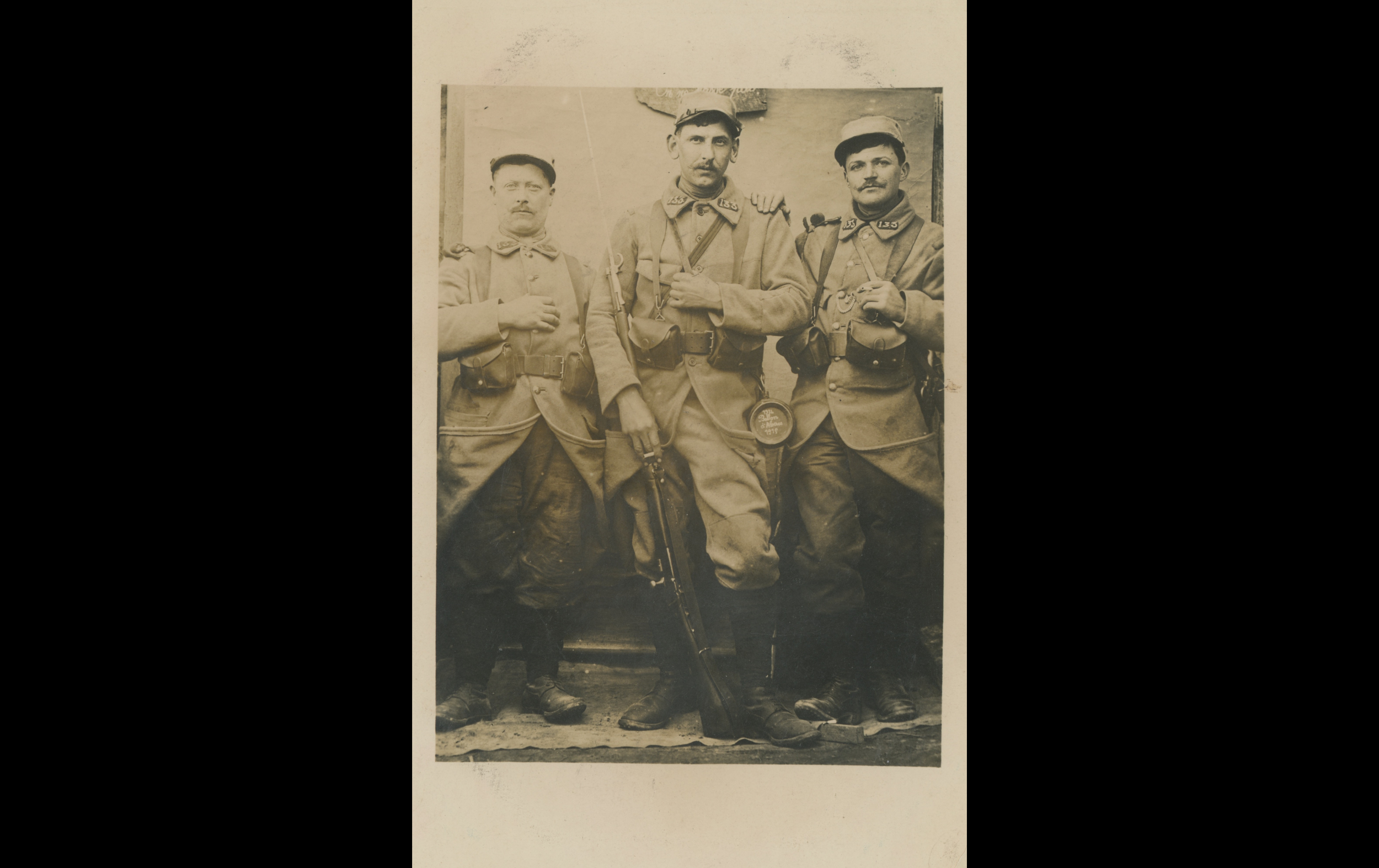 (15.55.A) Photo of three infantrymen of the 133rd Infantry Regiment
Date: April 30th 1915
Location: Studio
Unit: 133rd Infantry Regiment
Author: Joseph Marius ANTOINE
Present in the photo:
1. Joseph Marius ANTOINE (Mle 735)
FM:  tinyurl.com/p8y3fjhv 