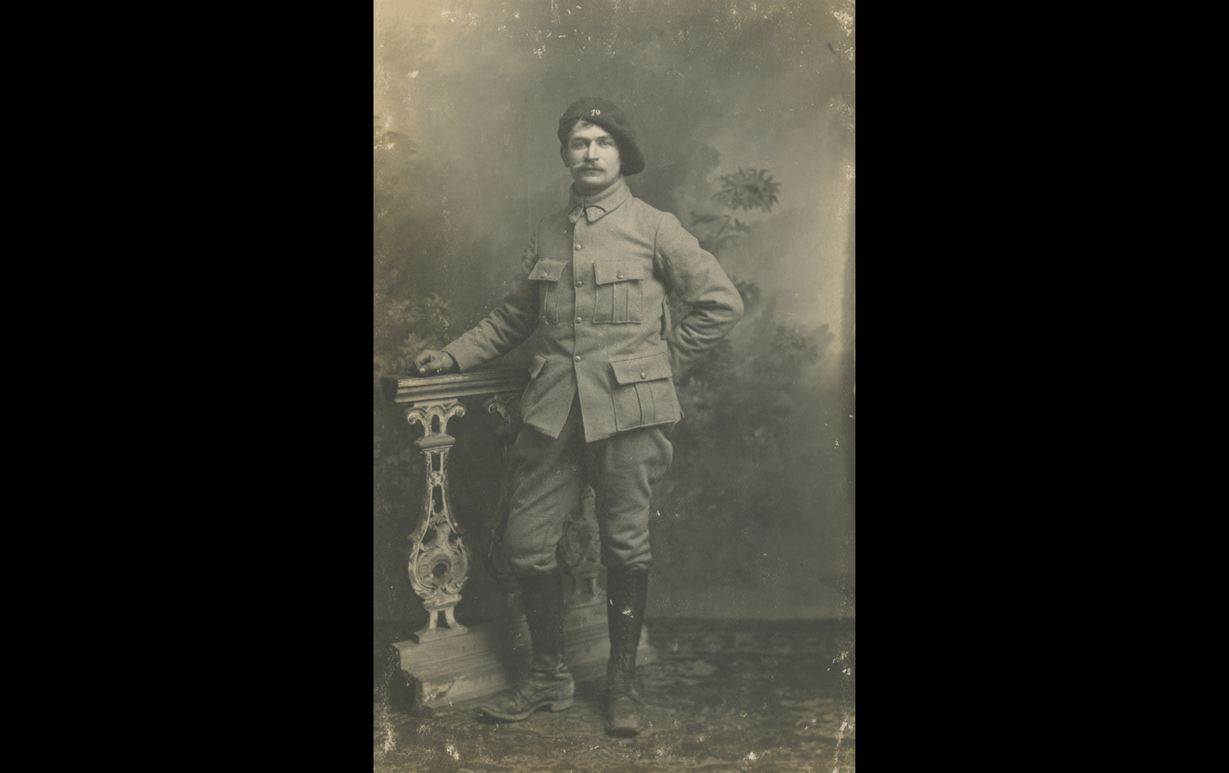 (16.38.A) Portrait of infantryman André Ferdinand Jean Baptiste CHAUMONT
Date: c.1916
Location: Studio
Unit: 79th Infantry Regiment, 3rd Group, 12th Company
Author: André Ferdinand Jean Baptiste CHAUMONT
Present in the photo: 
1. André Ferdinand Jean