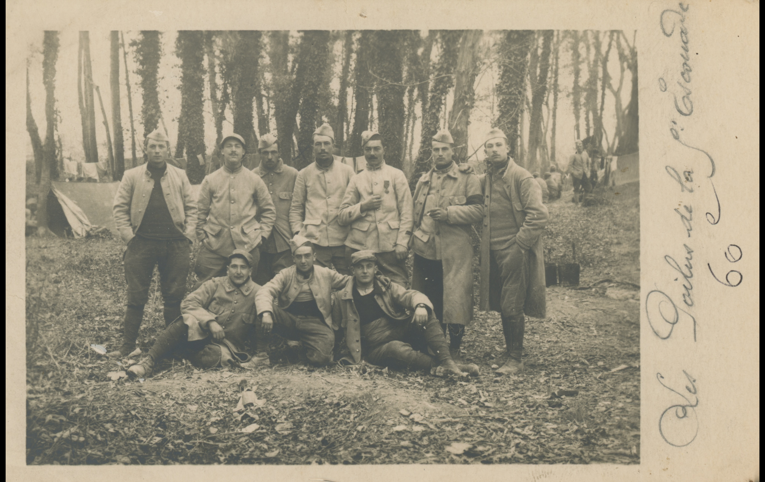 (15.46.A) Group photo of infantrymen of the 60th Infantry Regiment
Date: c.1915
Location: Champagne, France
Unit: 60th Infantry Regiment
Author: ?
Present in the photo: ?