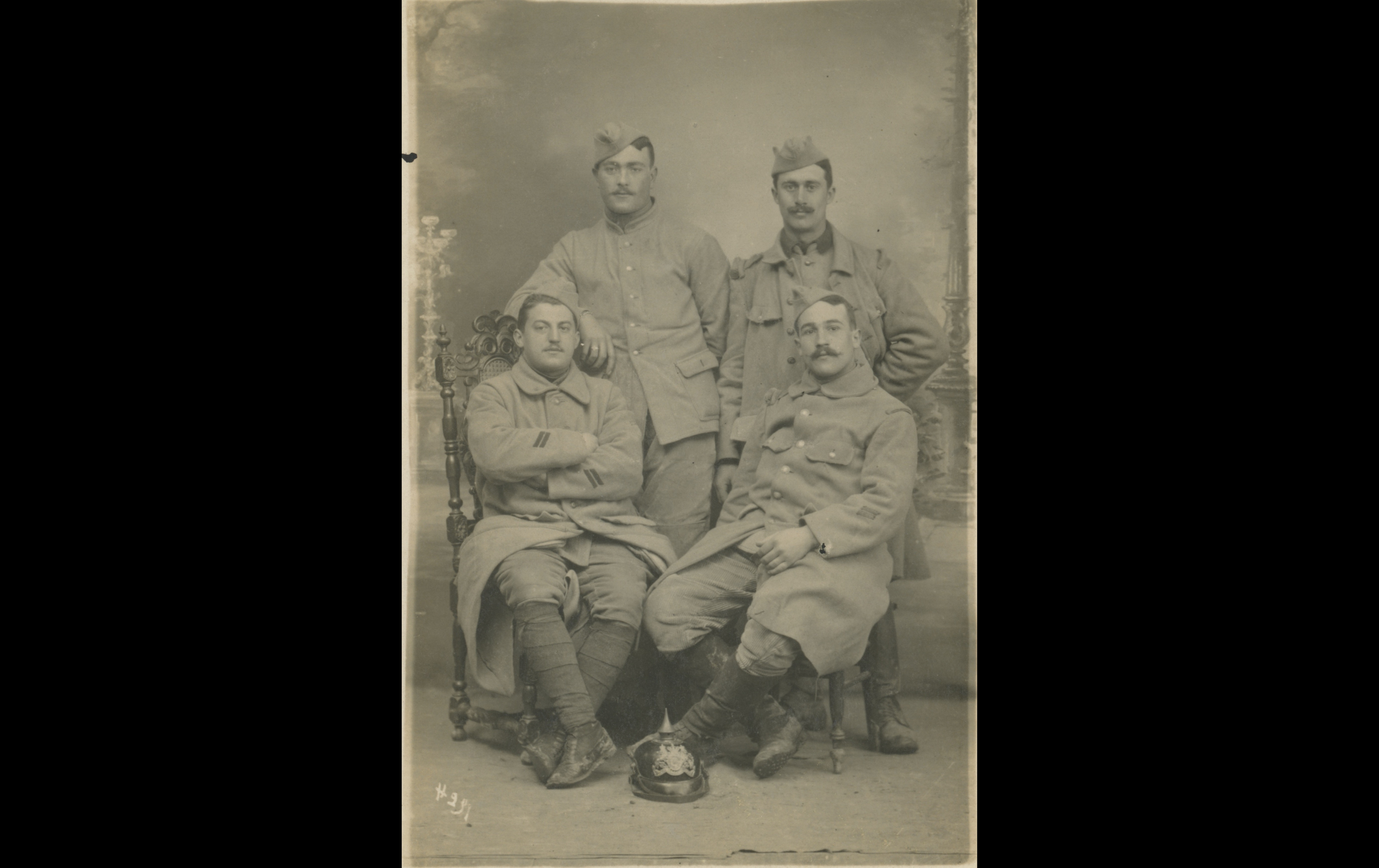 (16.13.A) Group photo of infantrymen with a captured Pickelhaube helmet
Date: March 27th 1916
Location: Studio
Unit: ?
Author: ?
Present in the photo: ?