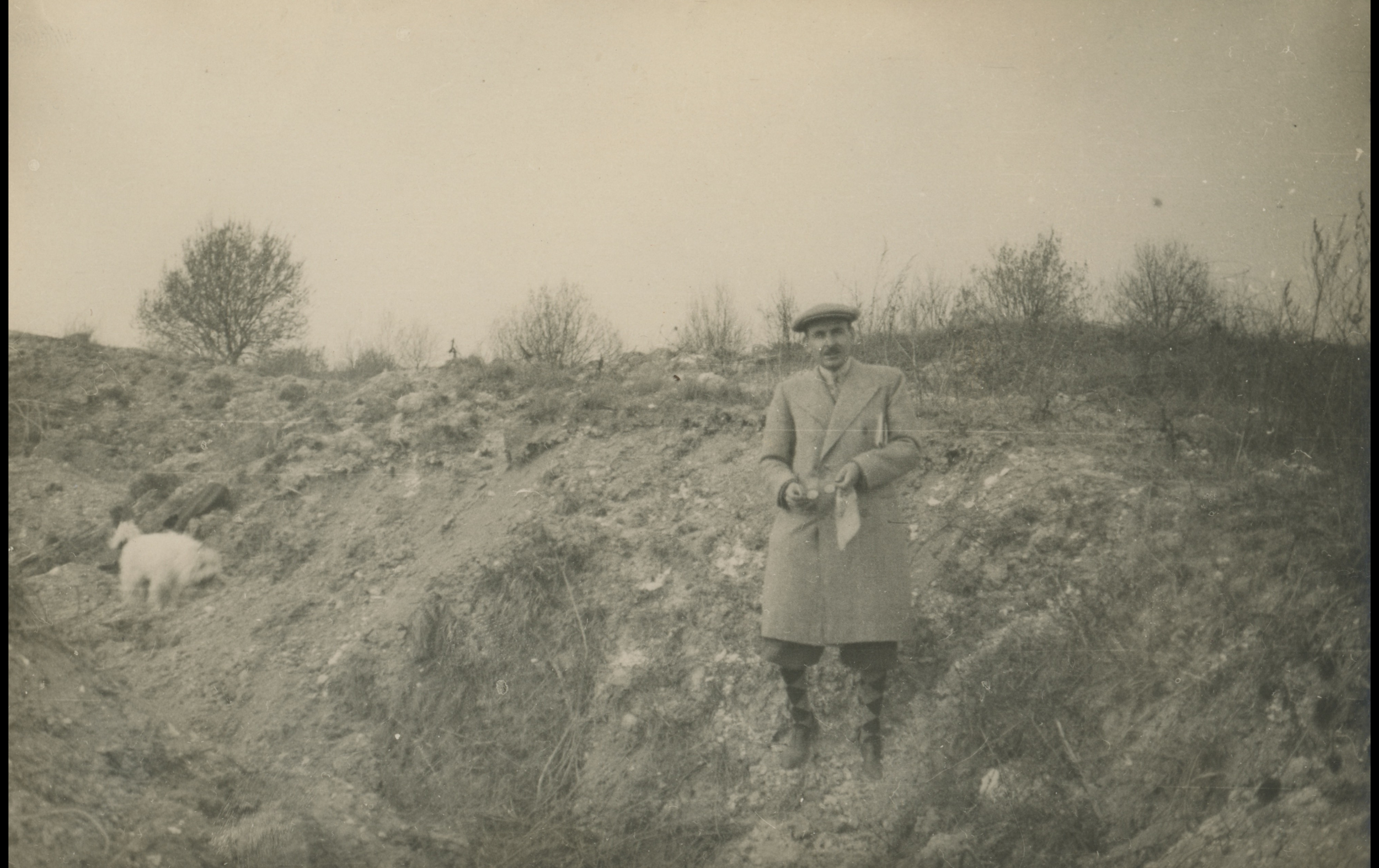 (18.21.A) Photo of a French veteran visiting a trench
Date: c.1920s
Location: ?
Unit: ?
Author: ?
Present in the photo: ?